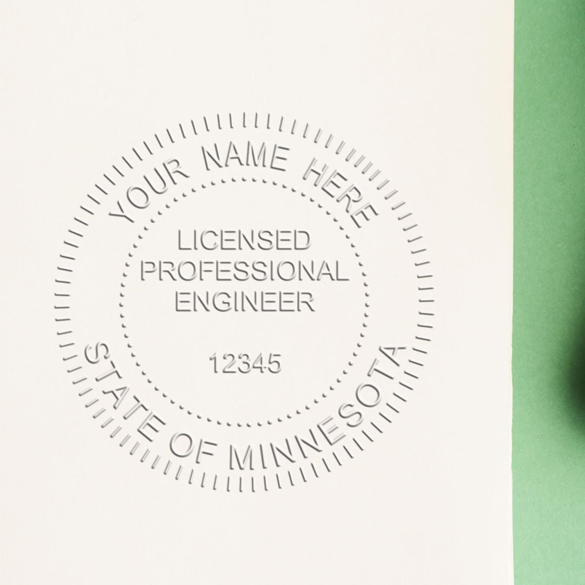 A lifestyle photo showing a stamped image of the Handheld Minnesota Professional Engineer Embosser on a piece of paper