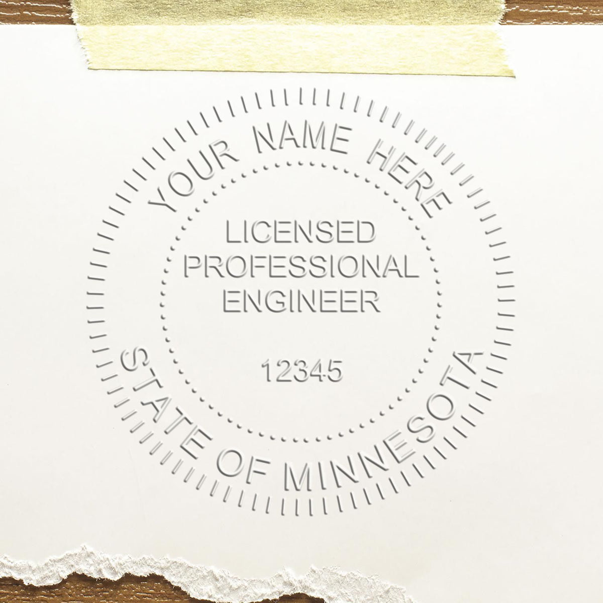 A stamped impression of the Handheld Minnesota Professional Engineer Embosser in this stylish lifestyle photo, setting the tone for a unique and personalized product.