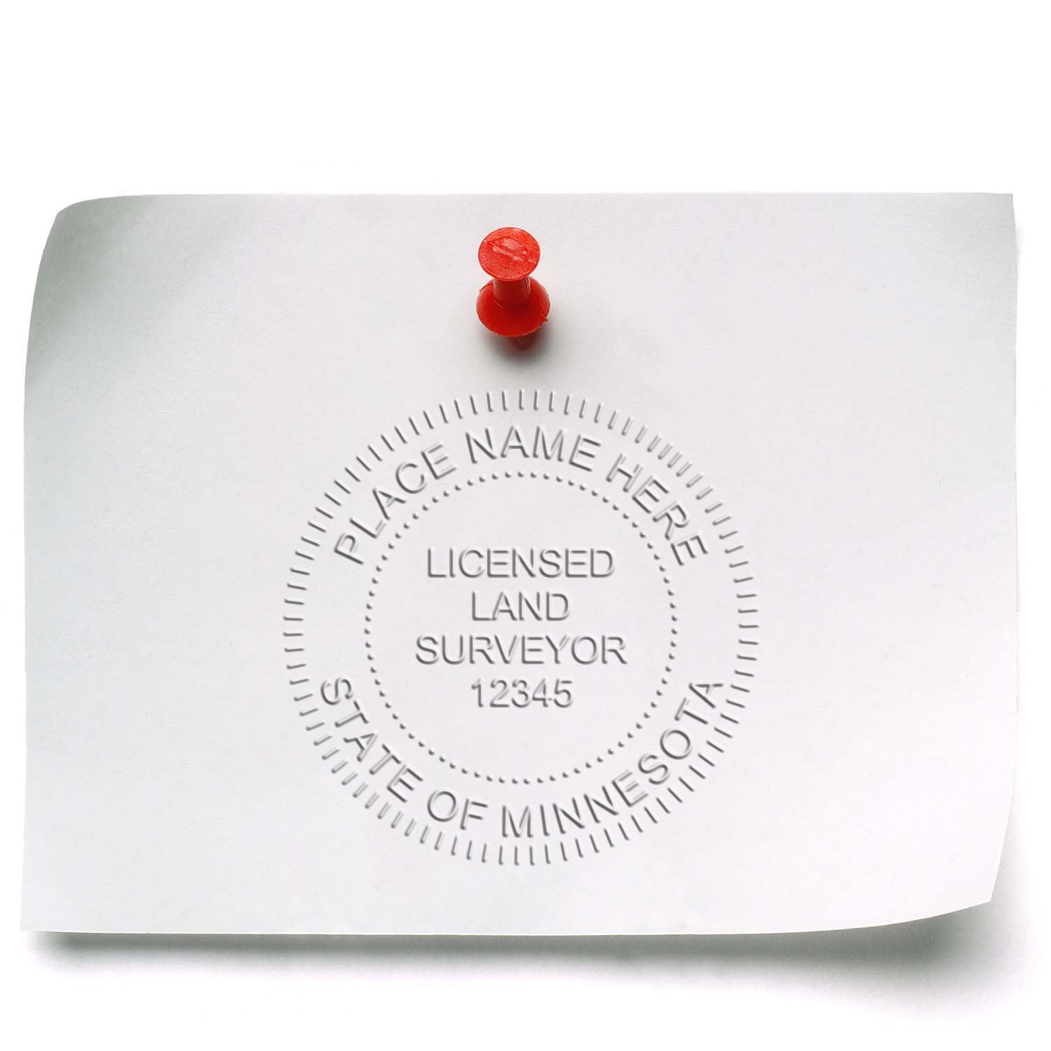 Another Example of a stamped impression of the State of Minnesota Soft Land Surveyor Embossing Seal on a piece of office paper.