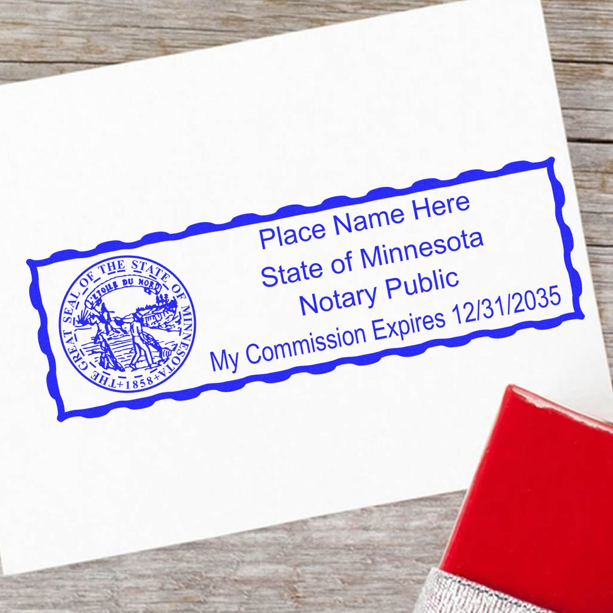 A lifestyle photo showing a stamped image of the Wooden Handle Minnesota State Seal Notary Public Stamp on a piece of paper