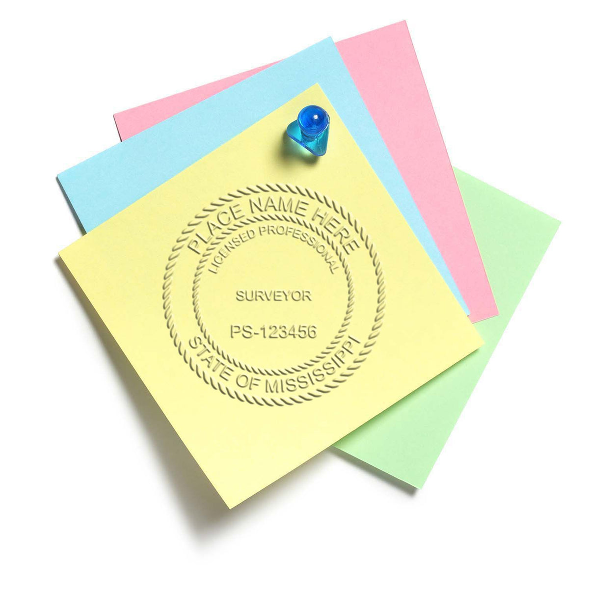 An in use photo of the Gift Mississippi Land Surveyor Seal showing a sample imprint on a cardstock