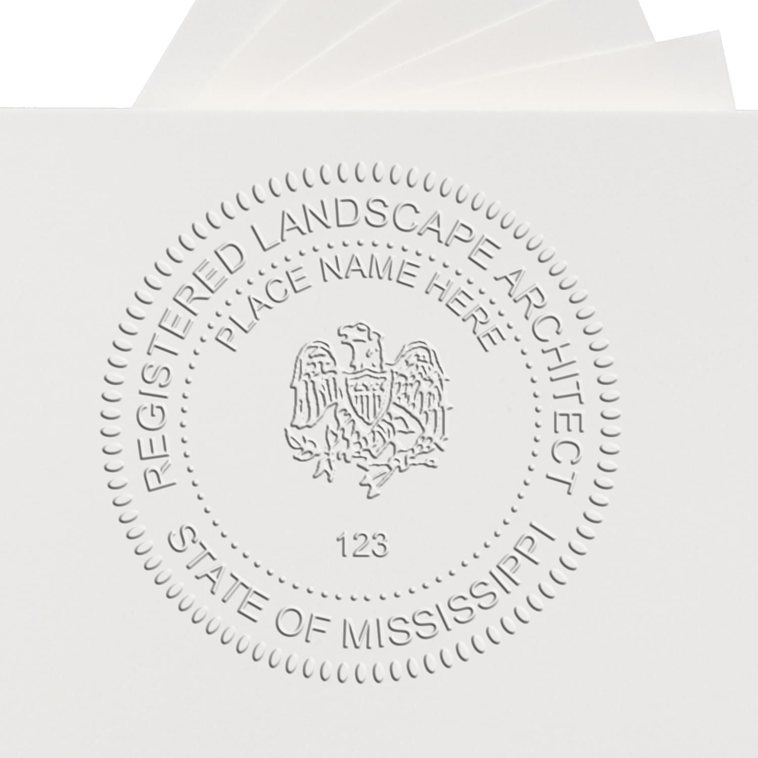 An in use photo of the Hybrid Mississippi Landscape Architect Seal showing a sample imprint on a cardstock