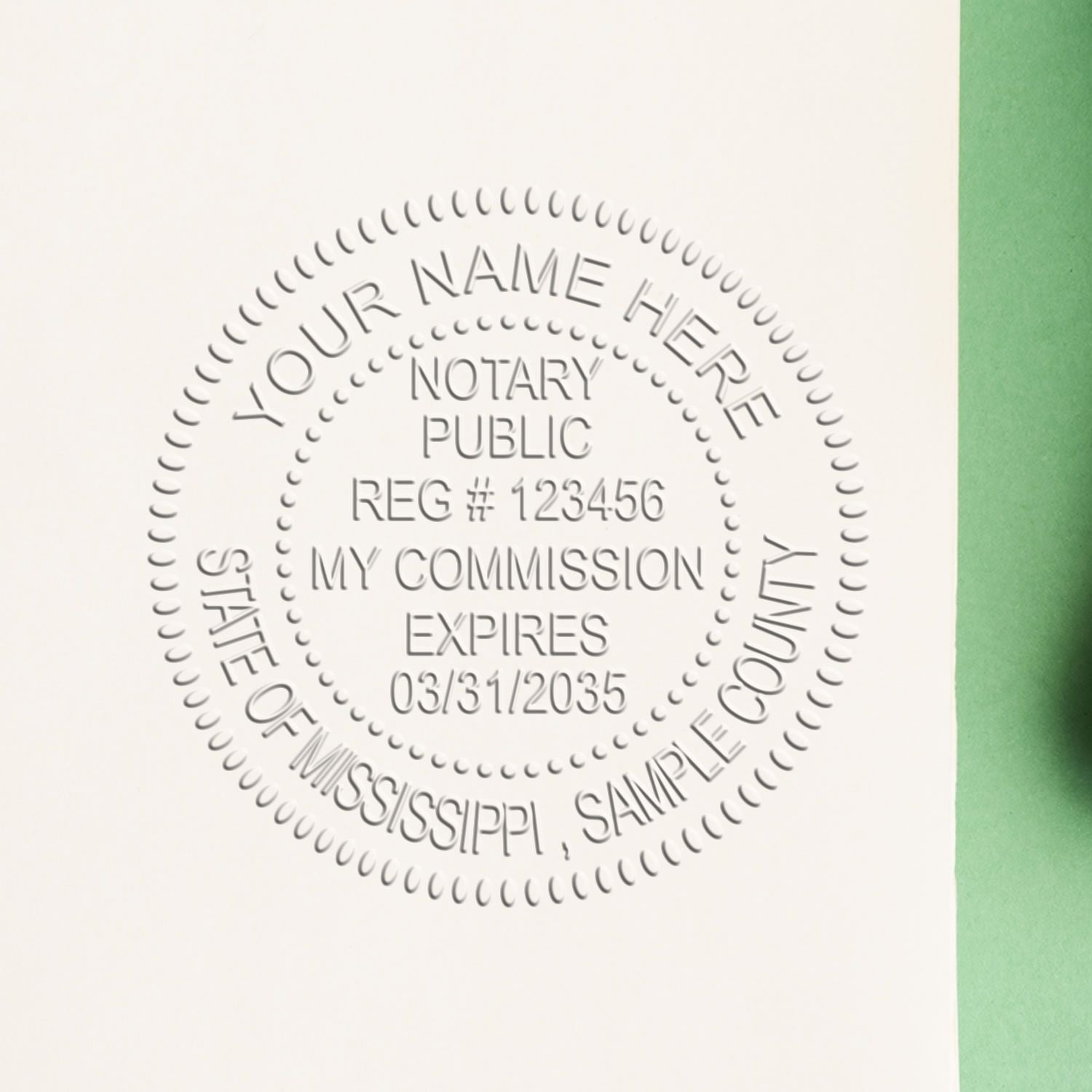 A stamped impression of the Mississippi Handheld Notary Seal Embosser in this stylish lifestyle photo, setting the tone for a unique and personalized product.