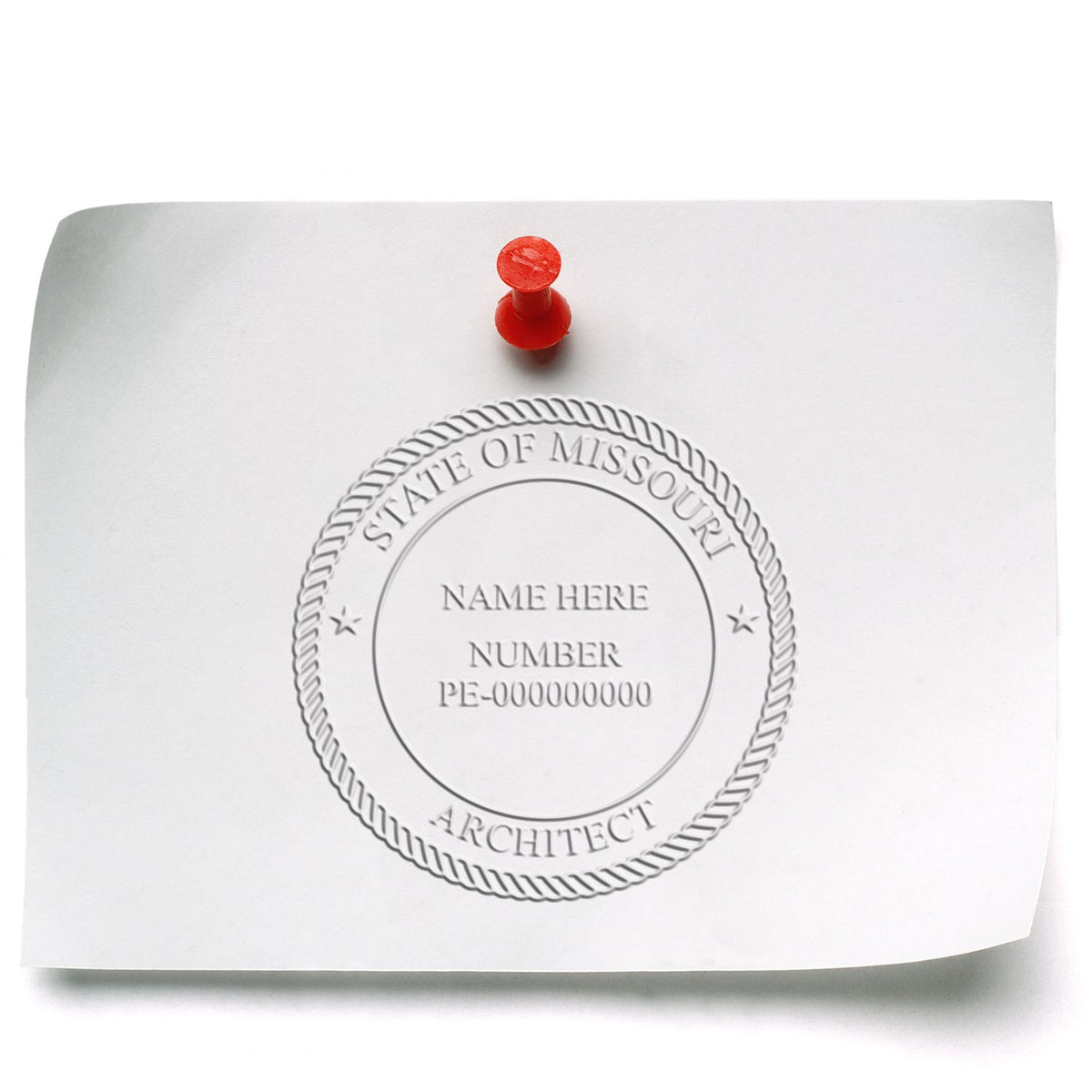 This paper is stamped with a sample imprint of the Handheld Missouri Architect Seal Embosser, signifying its quality and reliability.