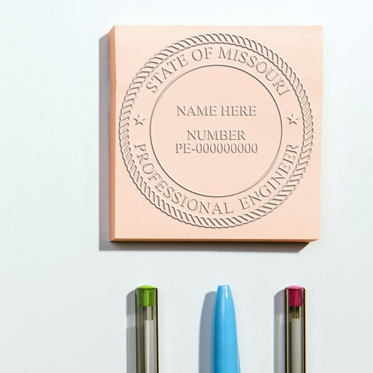 A stamped impression of the Soft Missouri Professional Engineer Seal in this stylish lifestyle photo, setting the tone for a unique and personalized product.