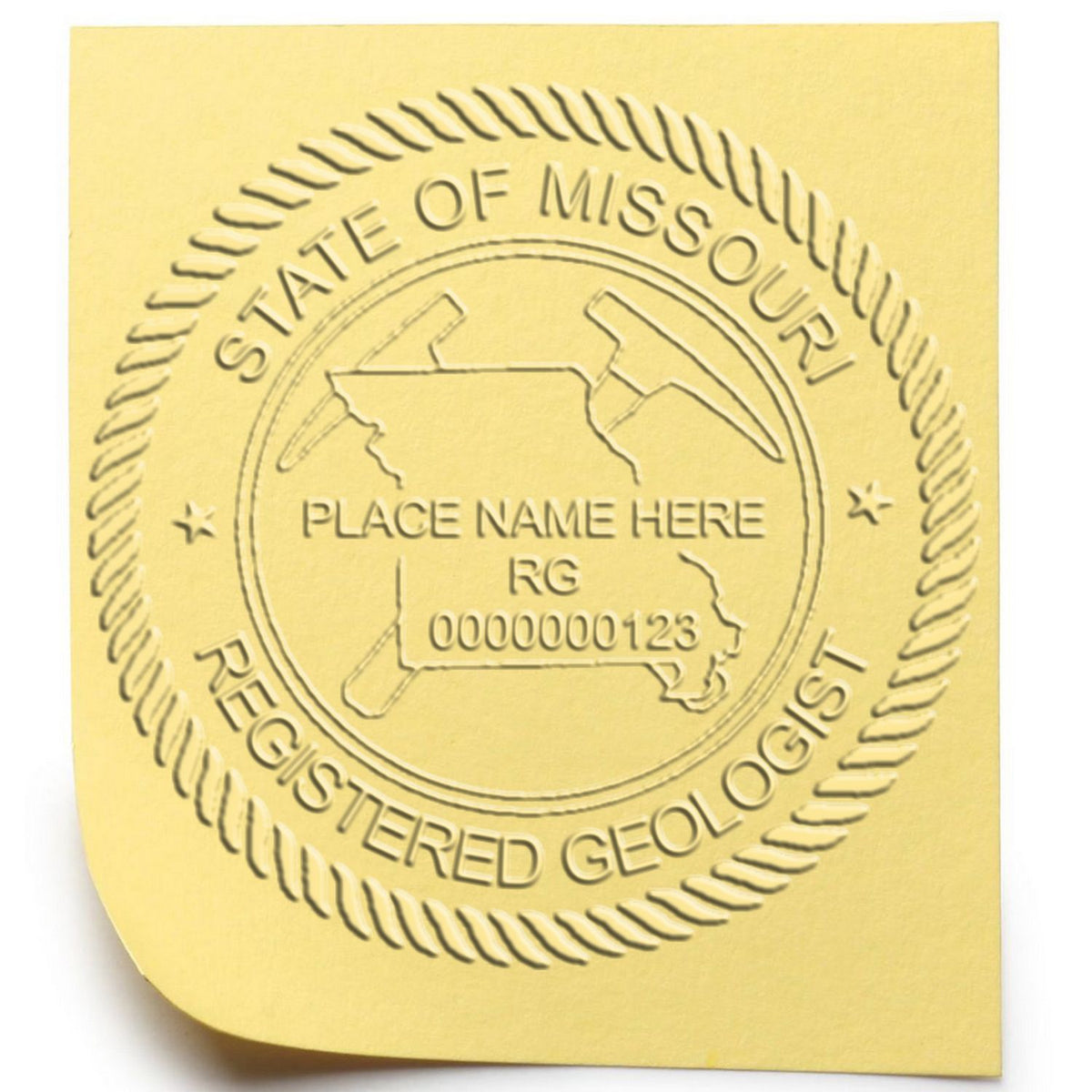 A lifestyle photo showing a stamped image of the Handheld Missouri Professional Geologist Embosser on a piece of paper