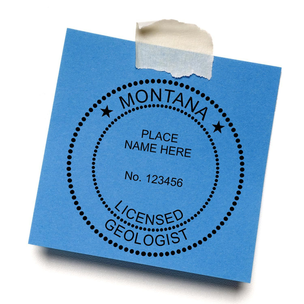 A lifestyle photo showing a stamped image of the Slim Pre-Inked Montana Professional Geologist Seal Stamp on a piece of paper
