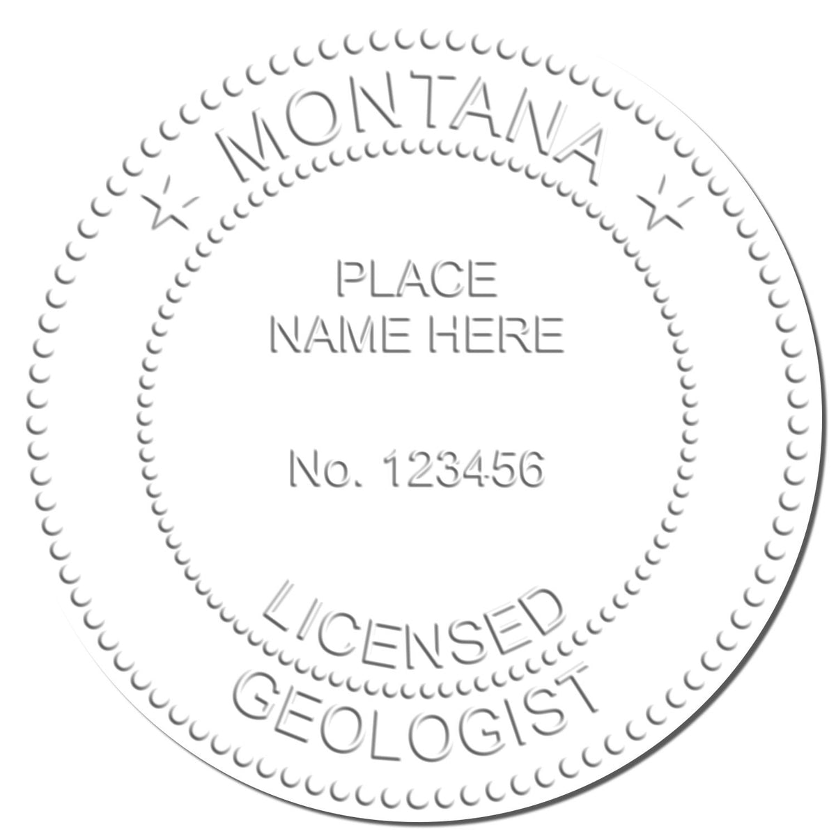An in use photo of the Heavy Duty Cast Iron Montana Geologist Seal Embosser showing a sample imprint on a cardstock