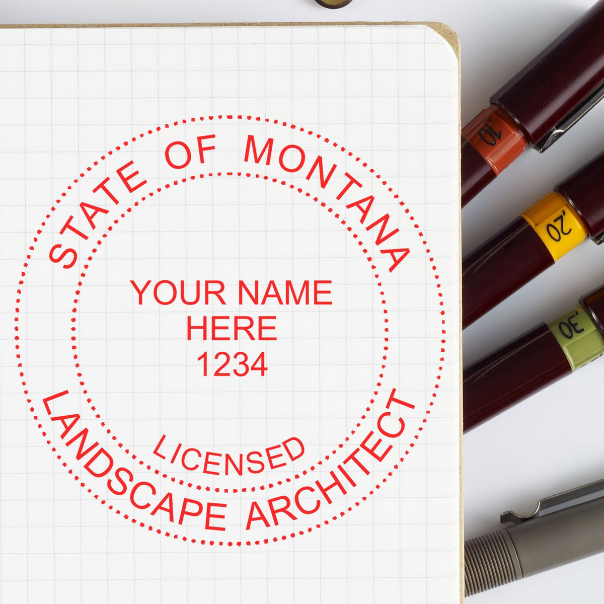 A stamped impression of the Slim Pre-Inked Montana Landscape Architect Seal Stamp in this stylish lifestyle photo, setting the tone for a unique and personalized product.
