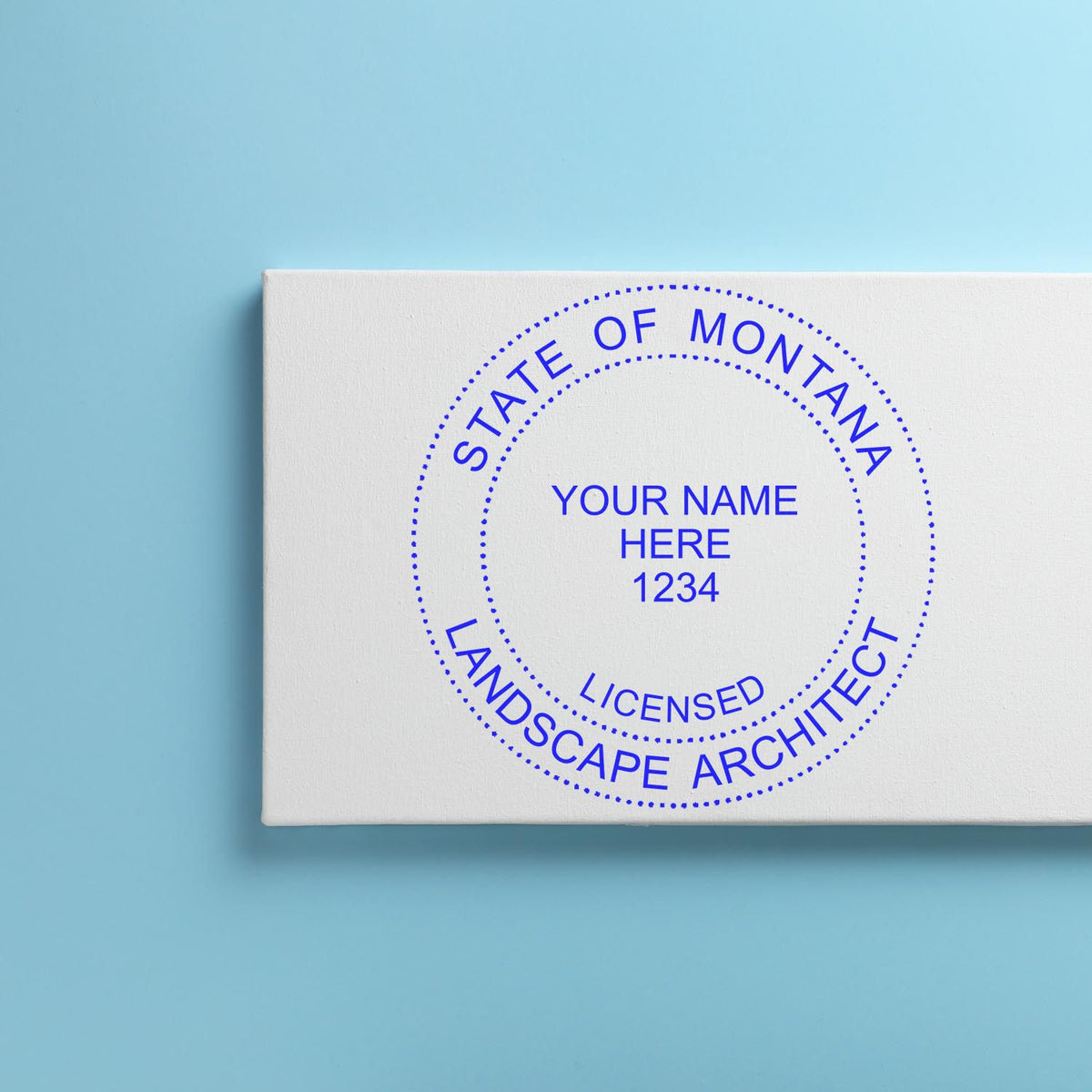 This paper is stamped with a sample imprint of the Self-Inking Montana Landscape Architect Stamp, signifying its quality and reliability.