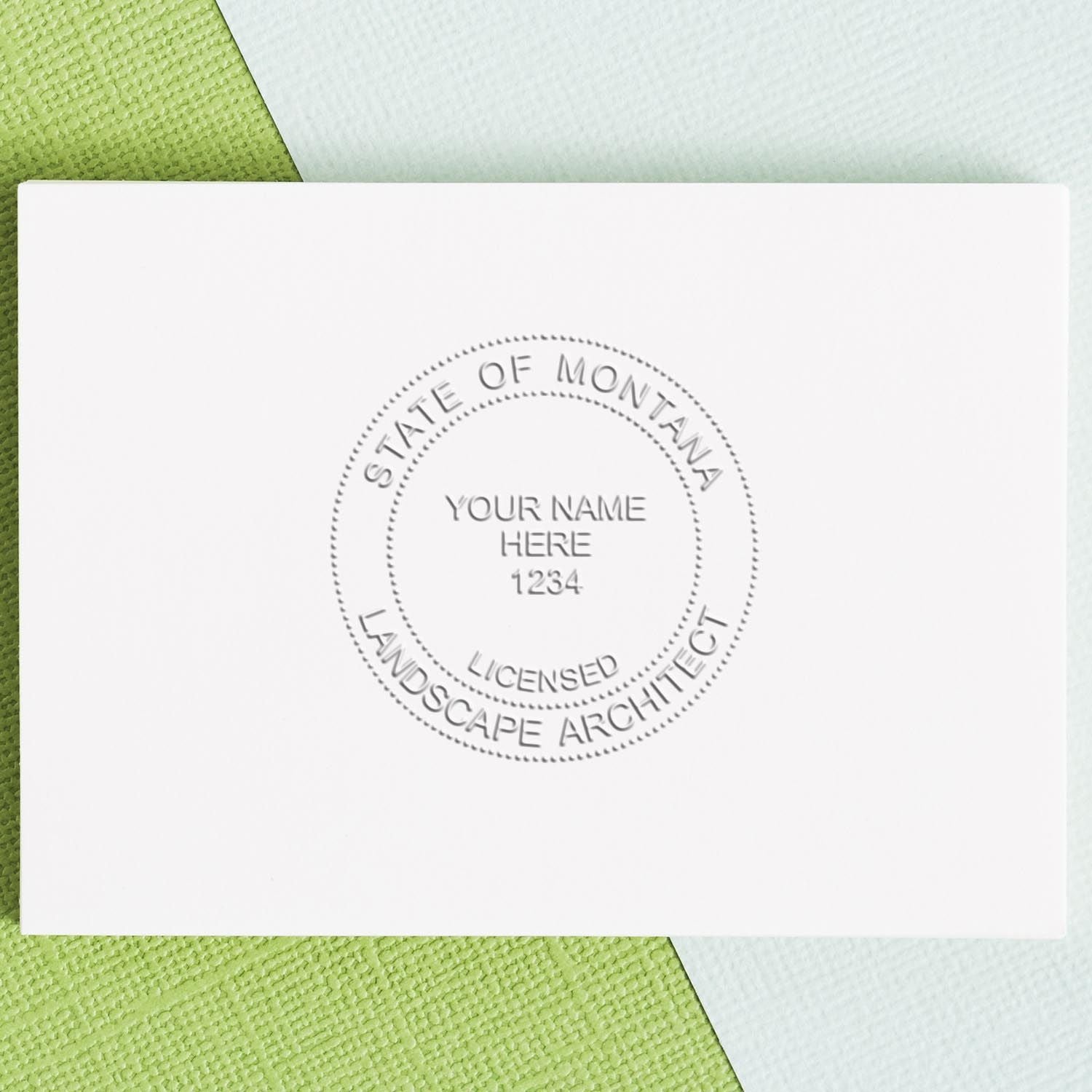 The State of Montana Handheld Landscape Architect Seal stamp impression comes to life with a crisp, detailed photo on paper - showcasing true professional quality.