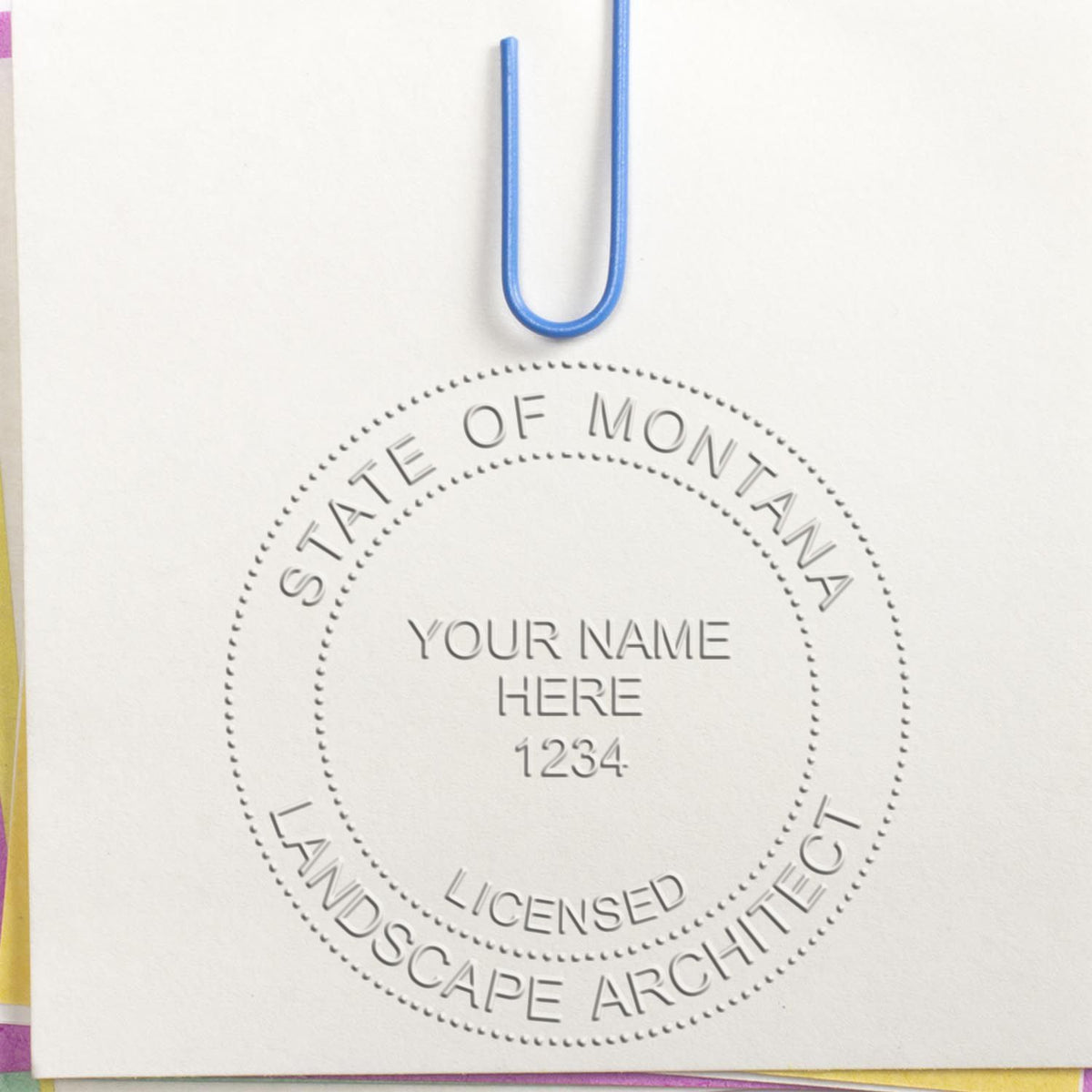 A photograph of the Hybrid Montana Landscape Architect Seal stamp impression reveals a vivid, professional image of the on paper.