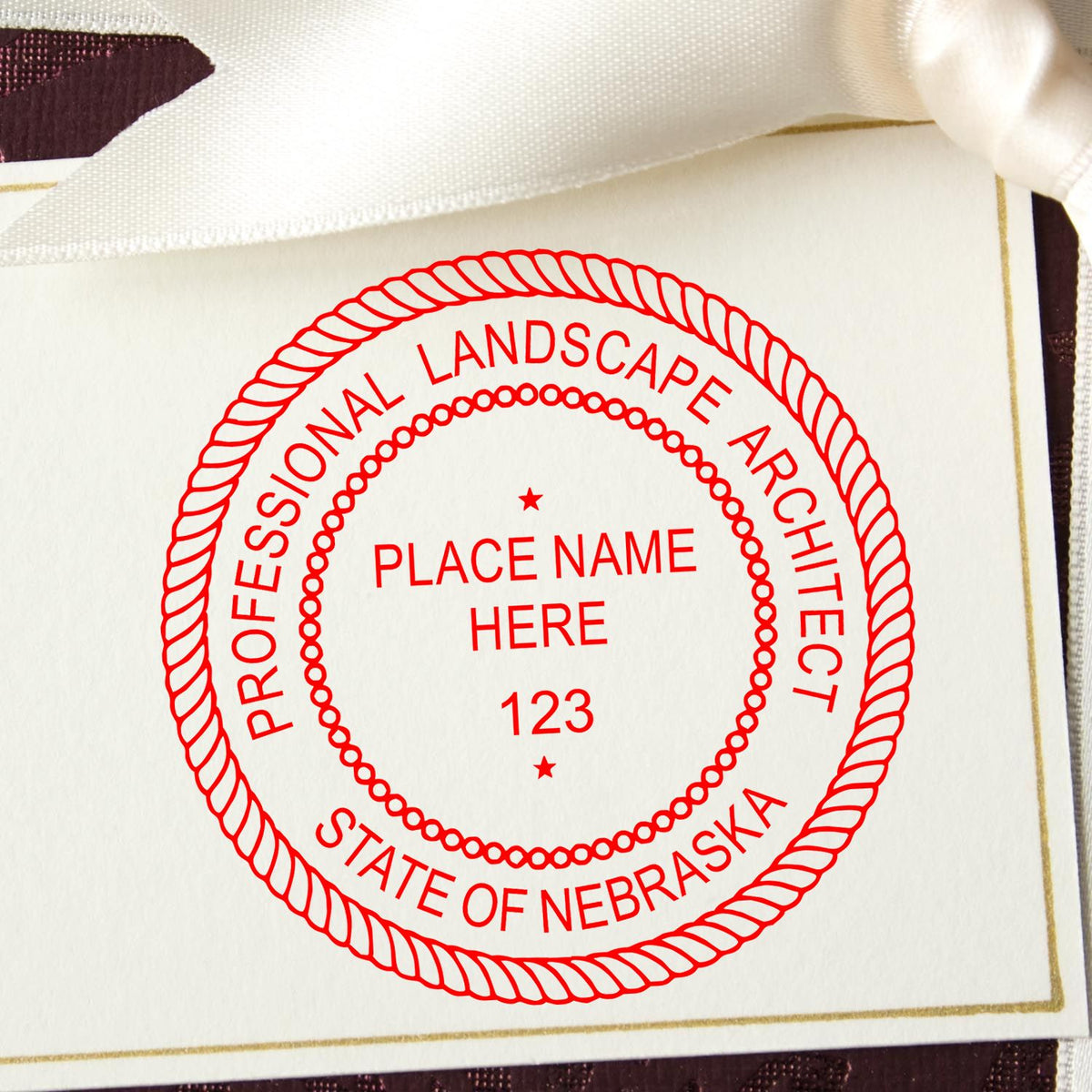 A stamped impression of the Slim Pre-Inked Nebraska Landscape Architect Seal Stamp in this stylish lifestyle photo, setting the tone for a unique and personalized product.