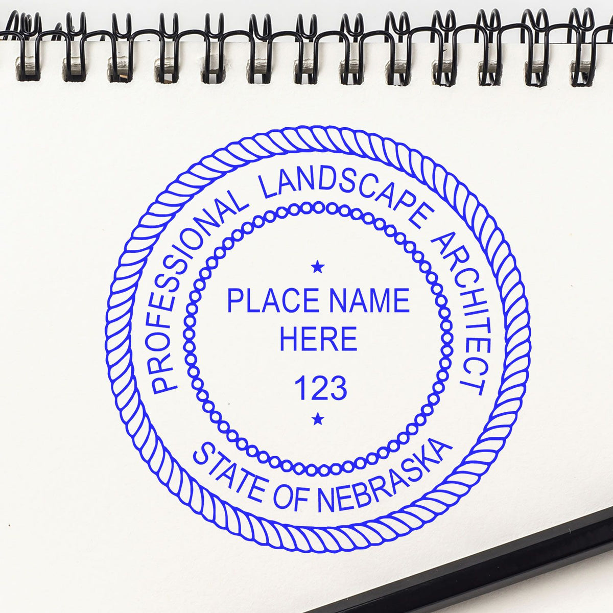 The Slim Pre-Inked Nebraska Landscape Architect Seal Stamp stamp impression comes to life with a crisp, detailed photo on paper - showcasing true professional quality.