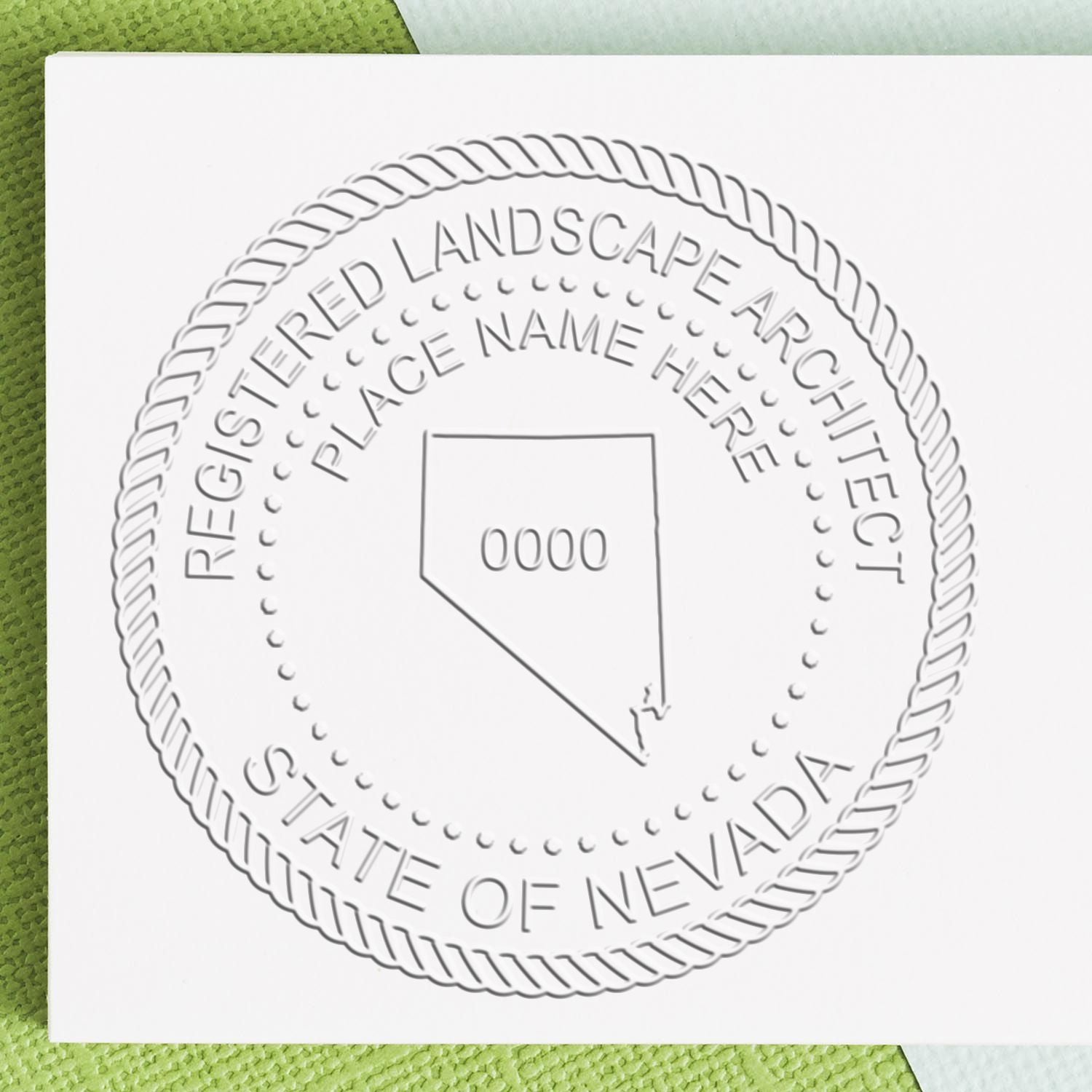 A photograph of the State of Nevada Handheld Landscape Architect Seal stamp impression reveals a vivid, professional image of the on paper.