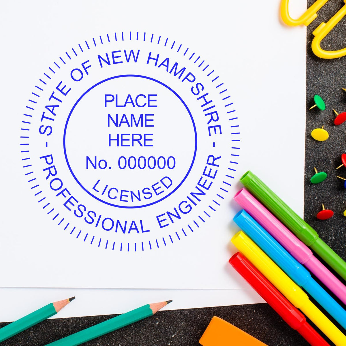 An alternative view of the New Hampshire Professional Engineer Seal Stamp stamped on a sheet of paper showing the image in use