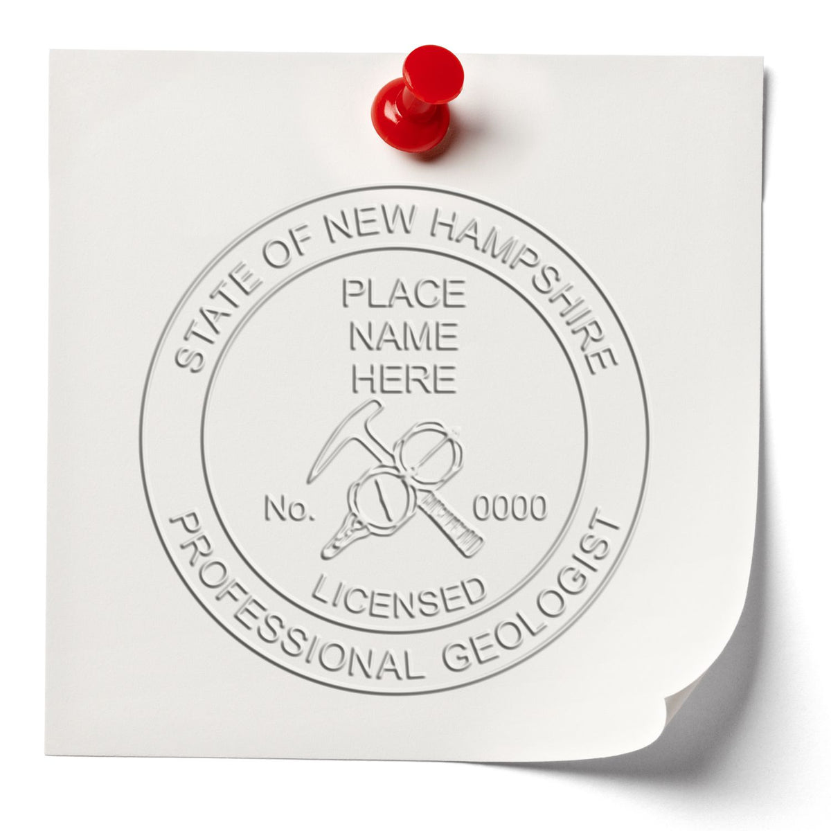 A lifestyle photo showing a stamped image of the Heavy Duty Cast Iron New Hampshire Geologist Seal Embosser on a piece of paper