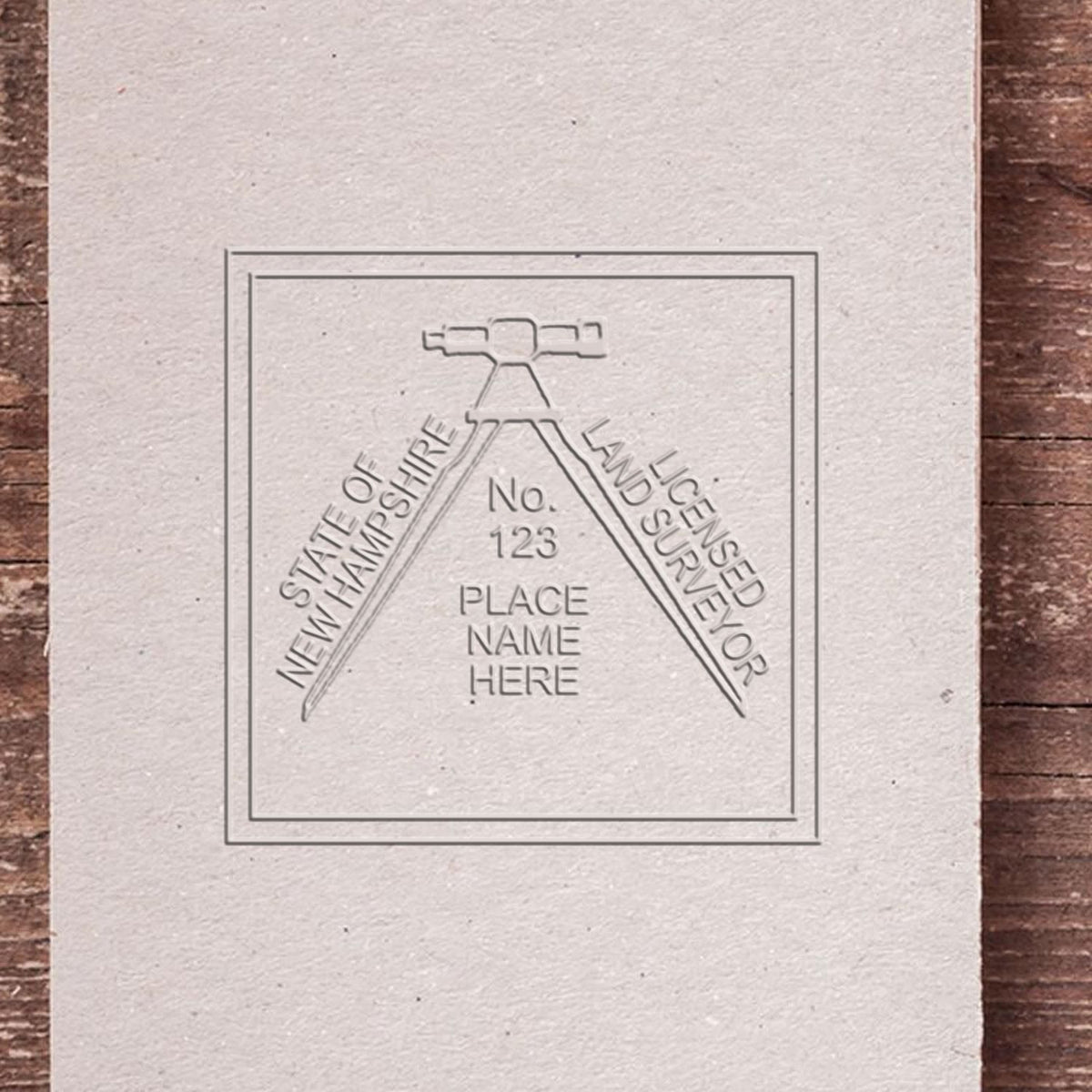 The Gift New Hampshire Land Surveyor Seal stamp impression comes to life with a crisp, detailed image stamped on paper - showcasing true professional quality.