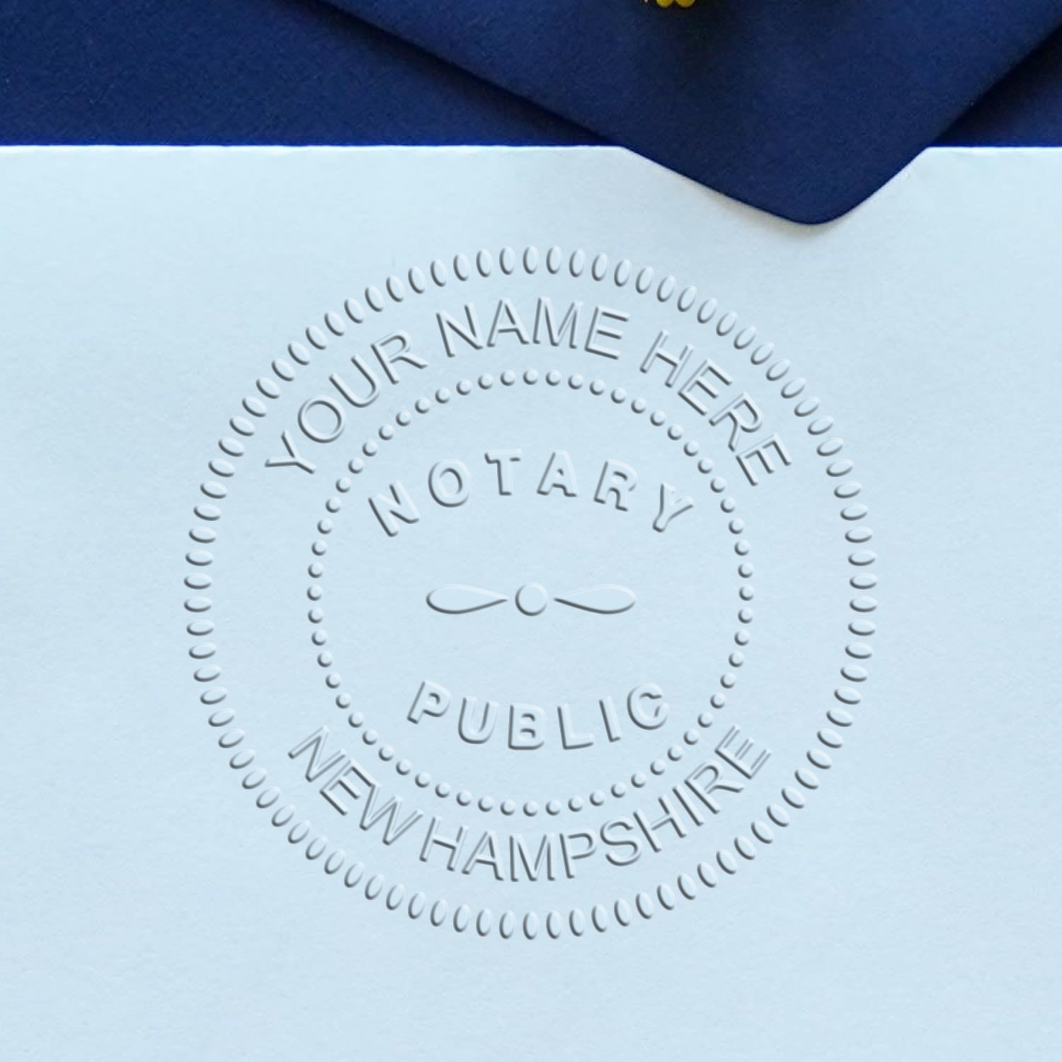 A lifestyle photo showing a stamped image of the Soft Seal New Hampshire Notary Seal on a piece of paper