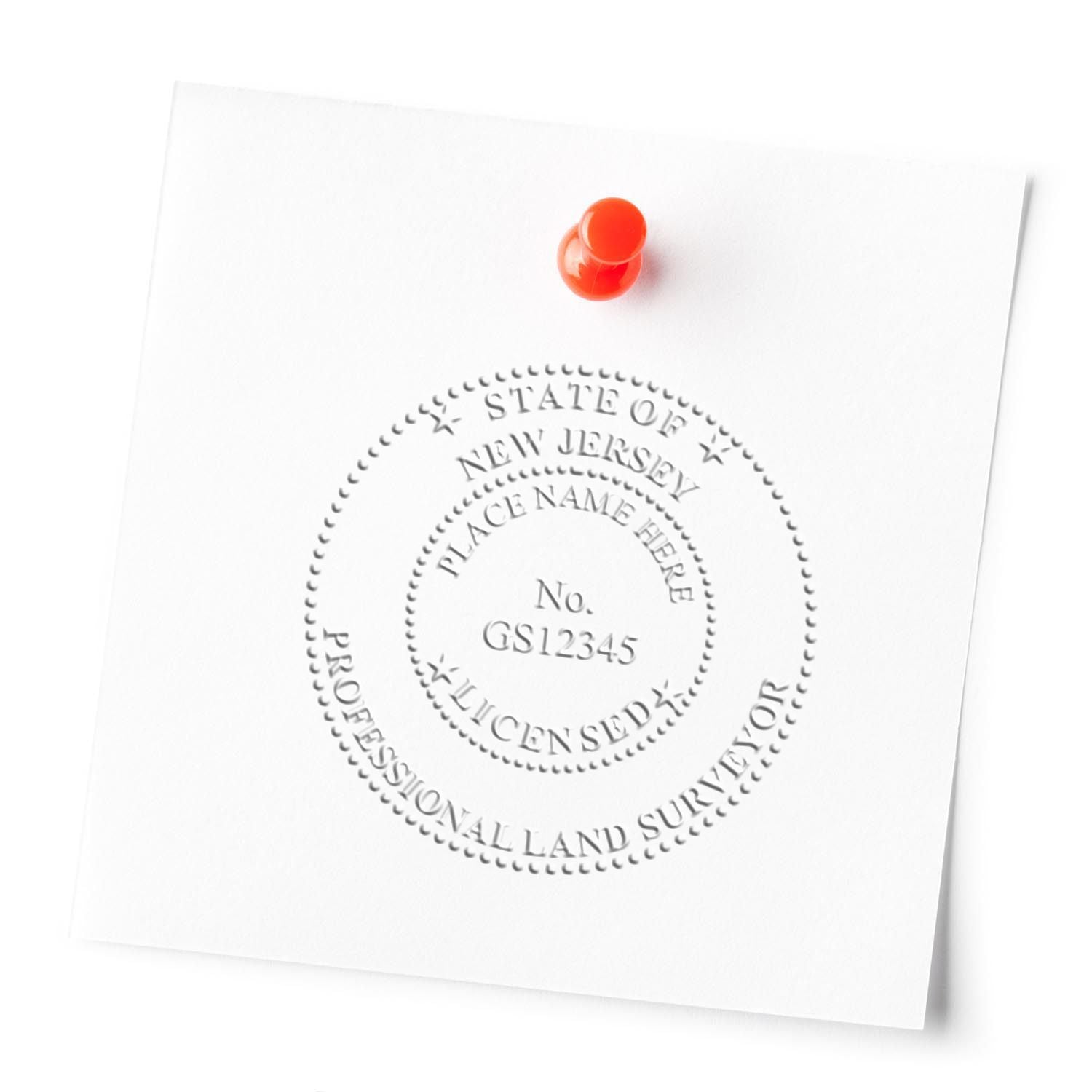 An alternative view of the Handheld New Jersey Land Surveyor Seal stamped on a sheet of paper showing the image in use