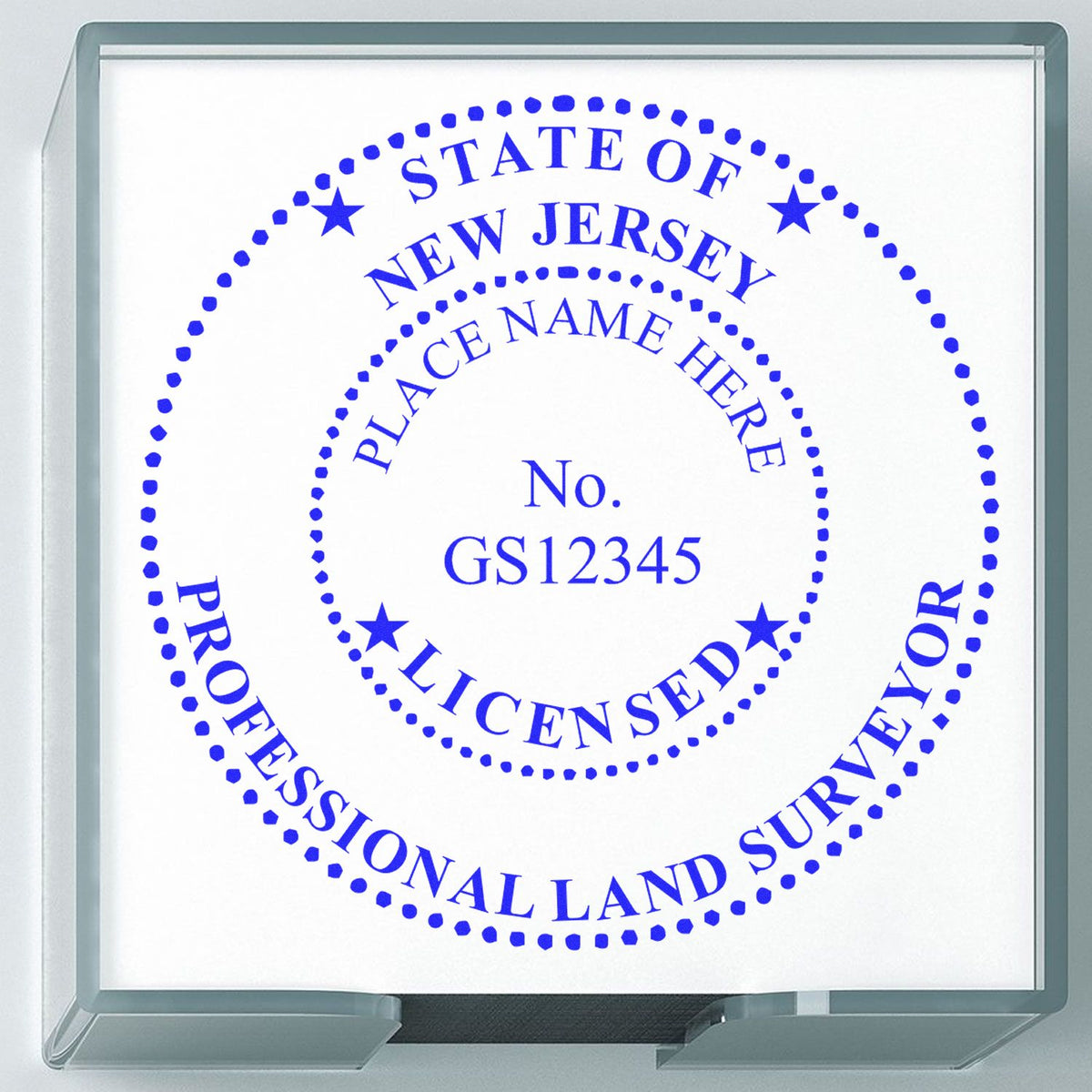 A lifestyle photo showing a stamped image of the Slim Pre-Inked New Jersey Land Surveyor Seal Stamp on a piece of paper