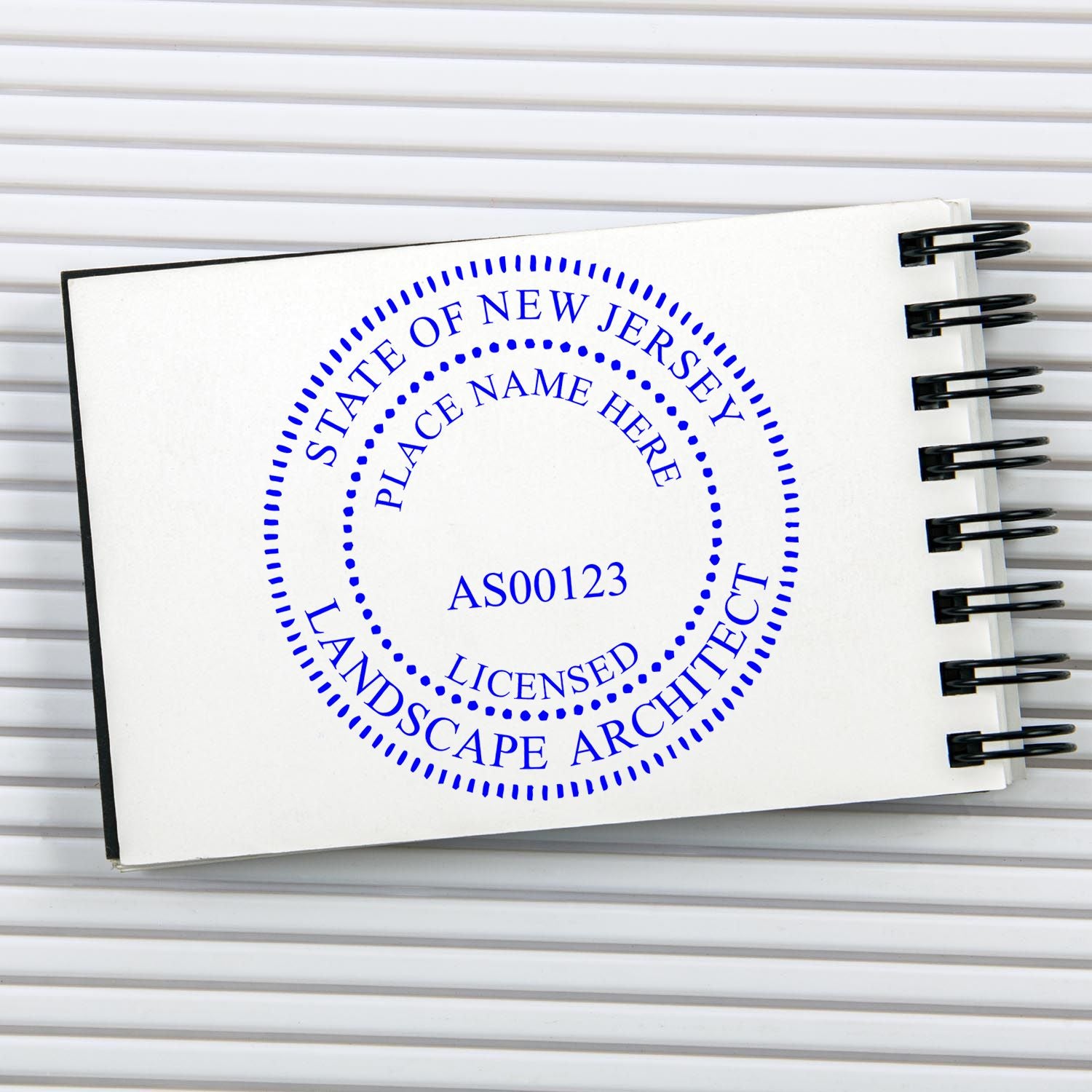 This paper is stamped with a sample imprint of the Self-Inking New Jersey Landscape Architect Stamp, signifying its quality and reliability.