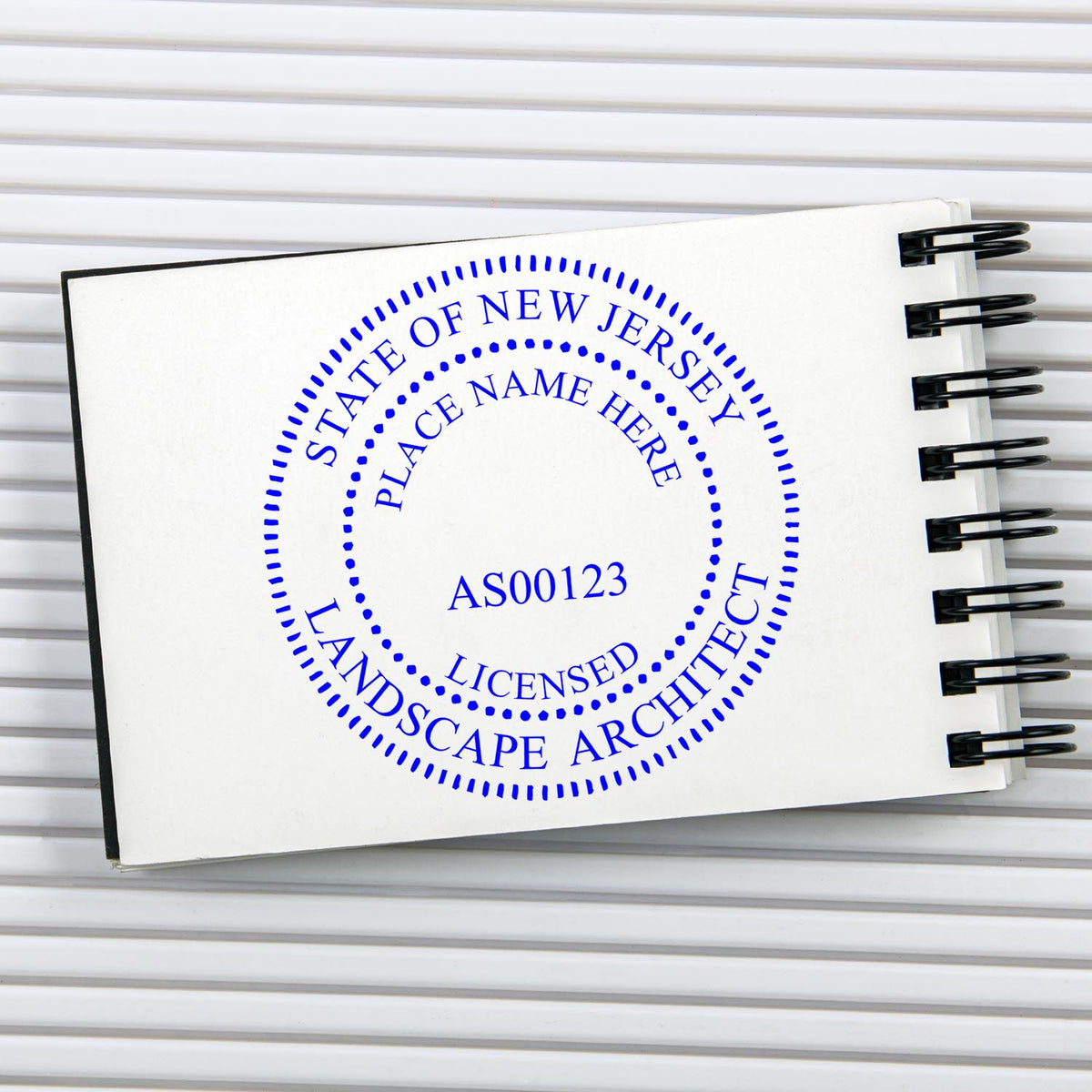 This paper is stamped with a sample imprint of the Self-Inking New Jersey Landscape Architect Stamp, signifying its quality and reliability.
