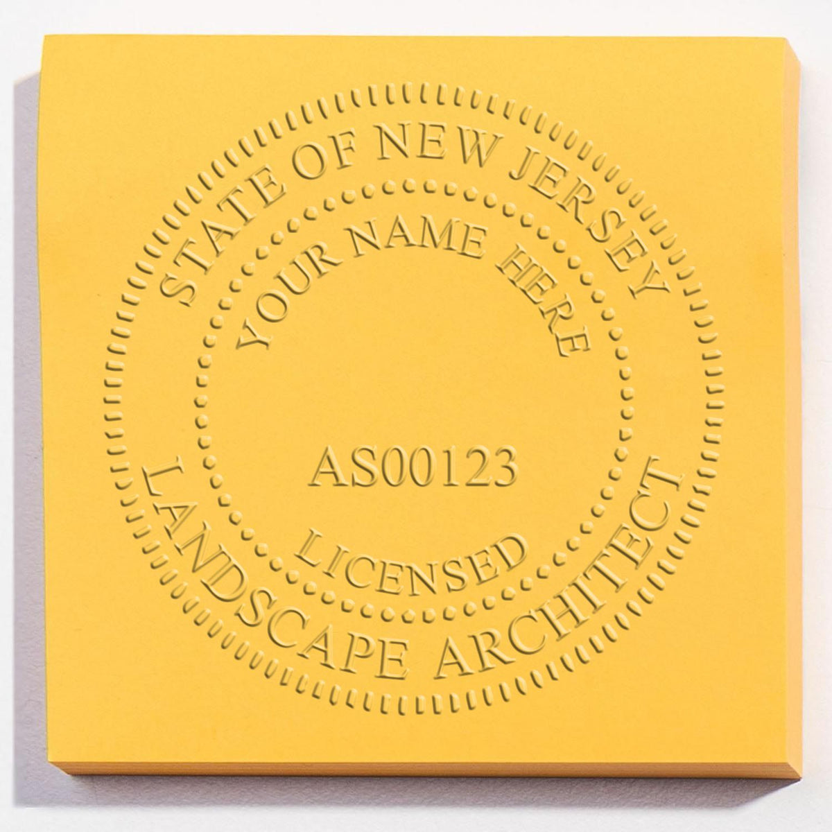 A stamped imprint of the Gift New Jersey Landscape Architect Seal in this stylish lifestyle photo, setting the tone for a unique and personalized product.
