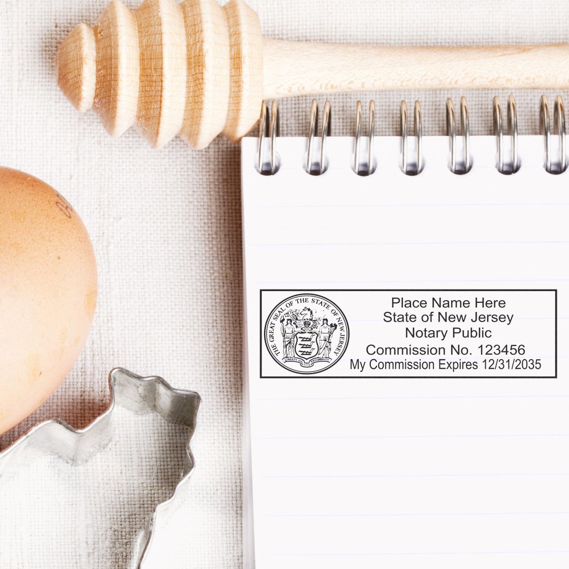 A lifestyle photo showing a stamped image of the MaxLight Premium Pre-Inked New Jersey State Seal Notarial Stamp on a piece of paper