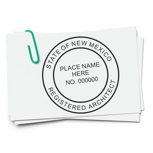 New Mexico Architect Seal Stamp on white paper with a green paperclip. The stamp reads State of New Mexico Registered Architect.