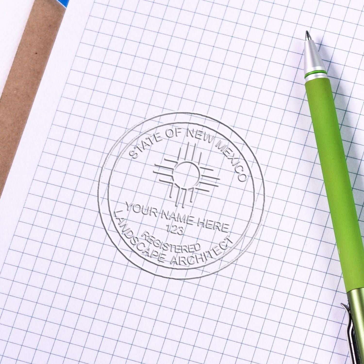 A photograph of the State of New Mexico Extended Long Reach Landscape Architect Seal Embosser stamp impression reveals a vivid, professional image of the on paper.