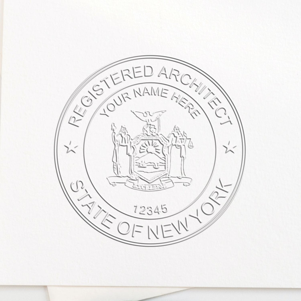 A lifestyle photo showing a stamped image of the New York Desk Architect Embossing Seal on a piece of paper