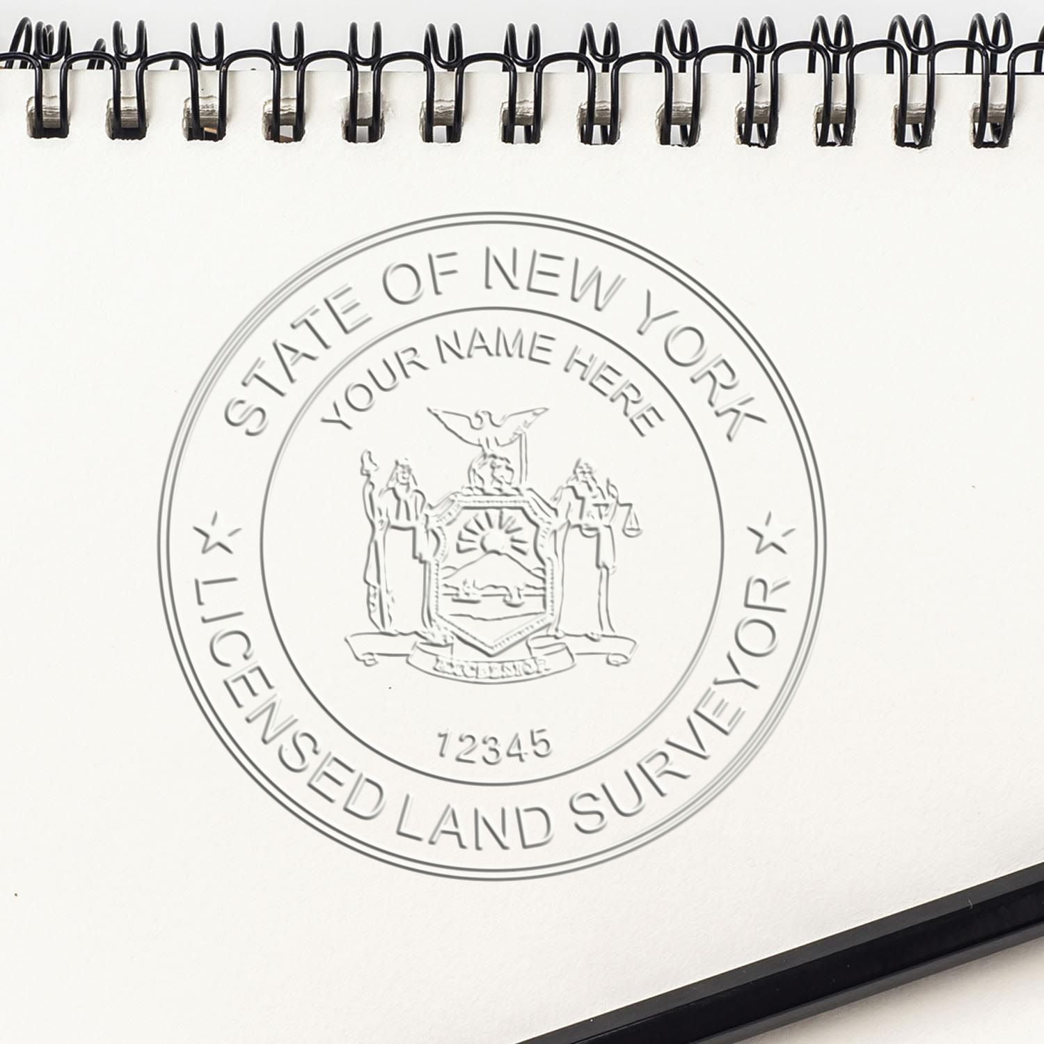 A lifestyle photo showing a stamped image of the New York Desk Surveyor Seal Embosser on a piece of paper