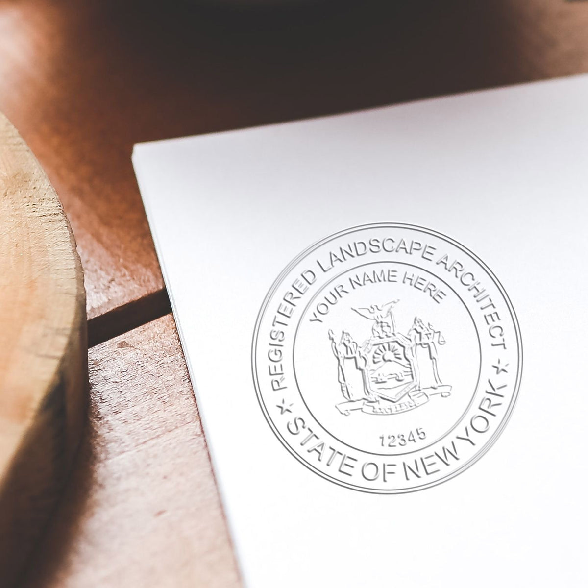 An alternative view of the Gift New York Landscape Architect Seal stamped on a sheet of paper showing the image in use