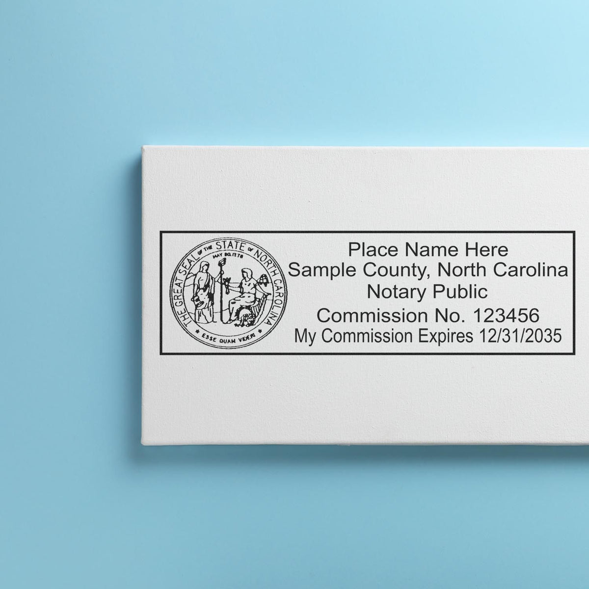 A photograph of the Wooden Handle North Carolina State Seal Notary Public Stamp stamp impression reveals a vivid, professional image of the on paper.