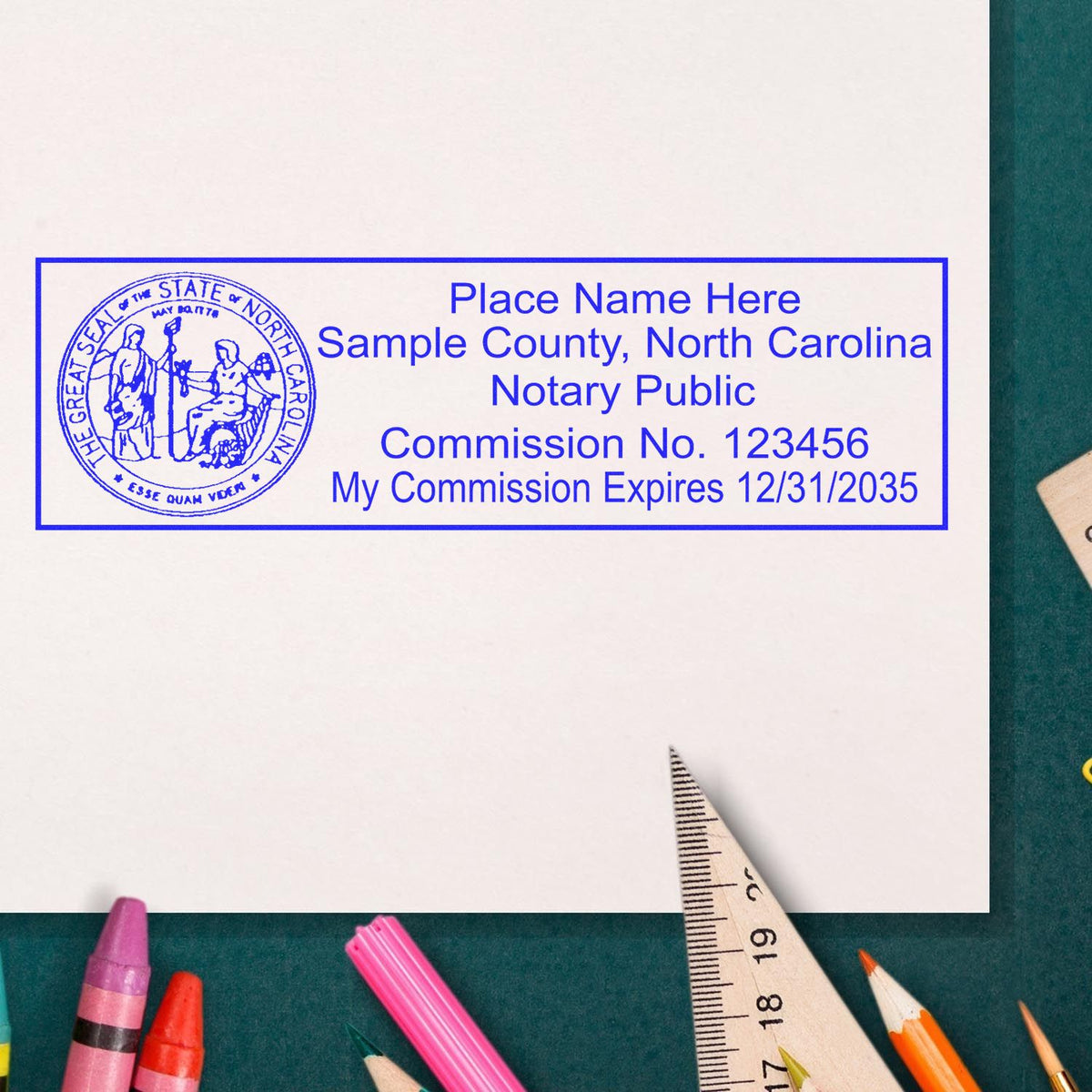 This paper is stamped with a sample imprint of the Wooden Handle North Carolina State Seal Notary Public Stamp, signifying its quality and reliability.