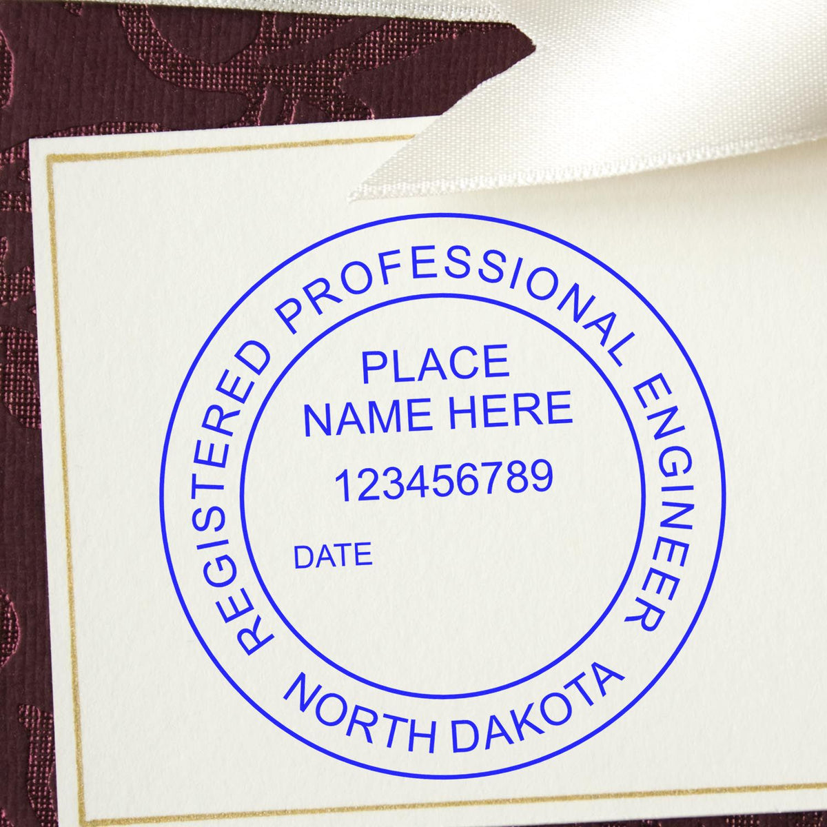 A lifestyle photo showing a stamped image of the Premium MaxLight Pre-Inked North Dakota Engineering Stamp on a piece of paper
