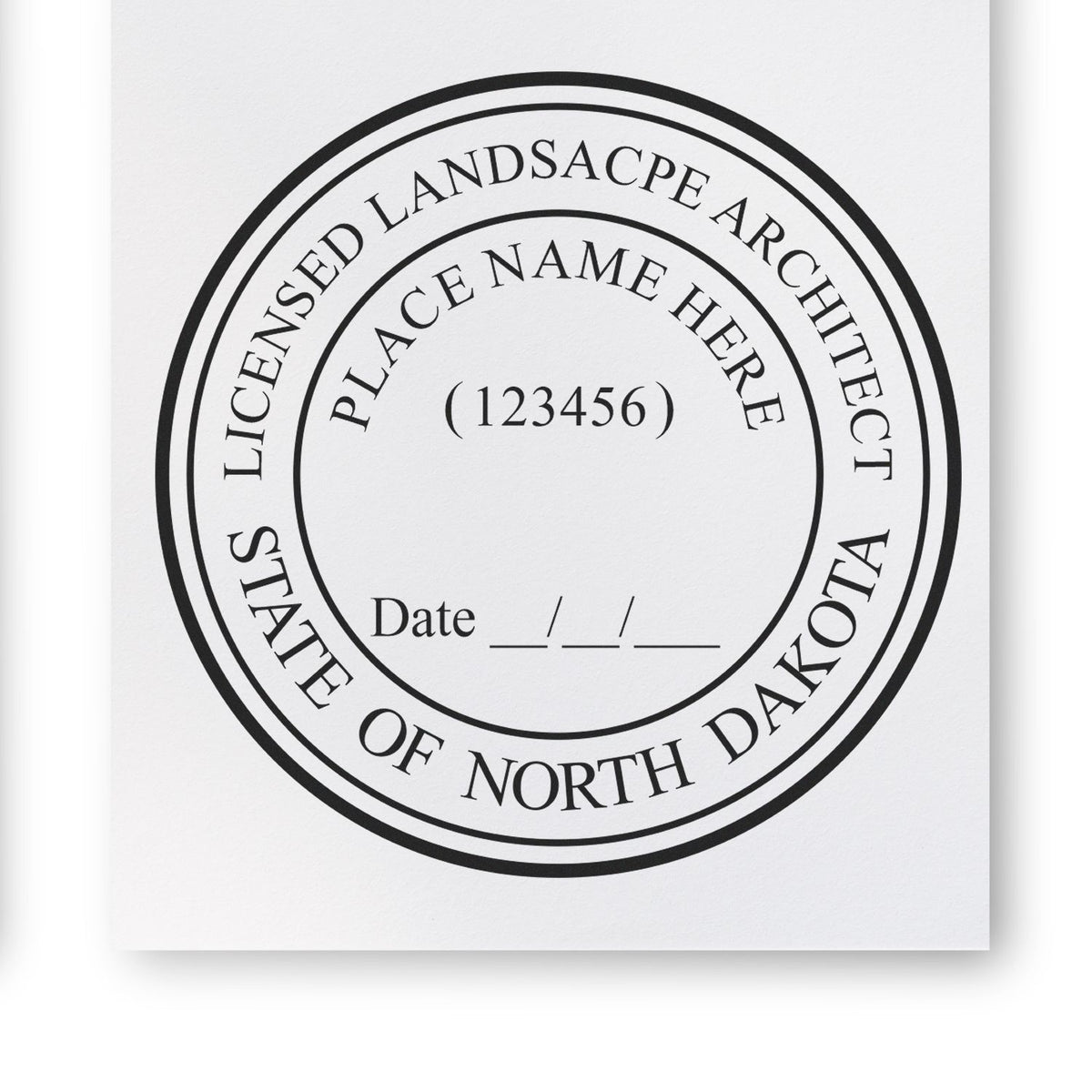 This paper is stamped with a sample imprint of the Premium MaxLight Pre-Inked North Dakota Landscape Architectural Stamp, signifying its quality and reliability.