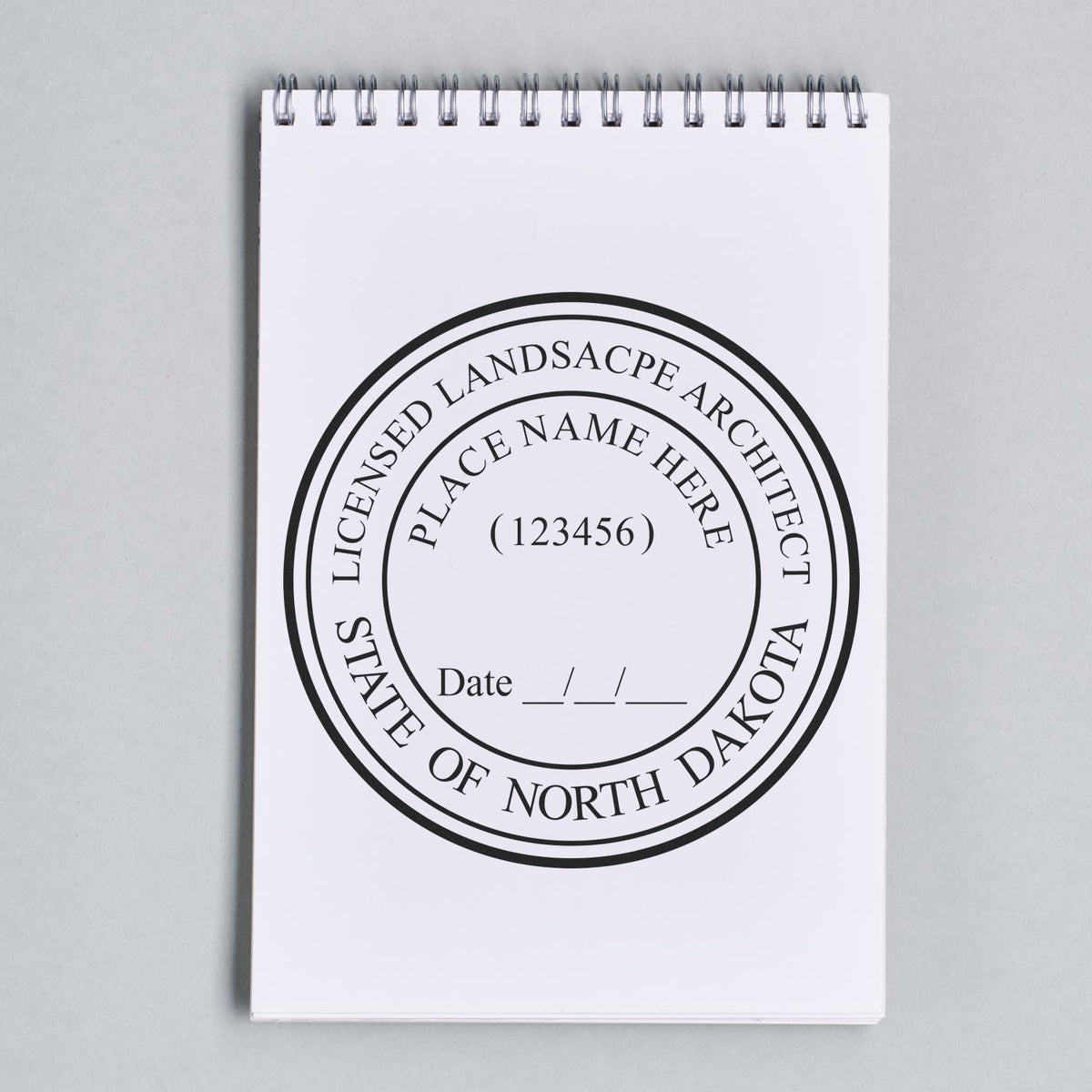 A stamped impression of the Self-Inking North Dakota Landscape Architect Stamp in this stylish lifestyle photo, setting the tone for a unique and personalized product.