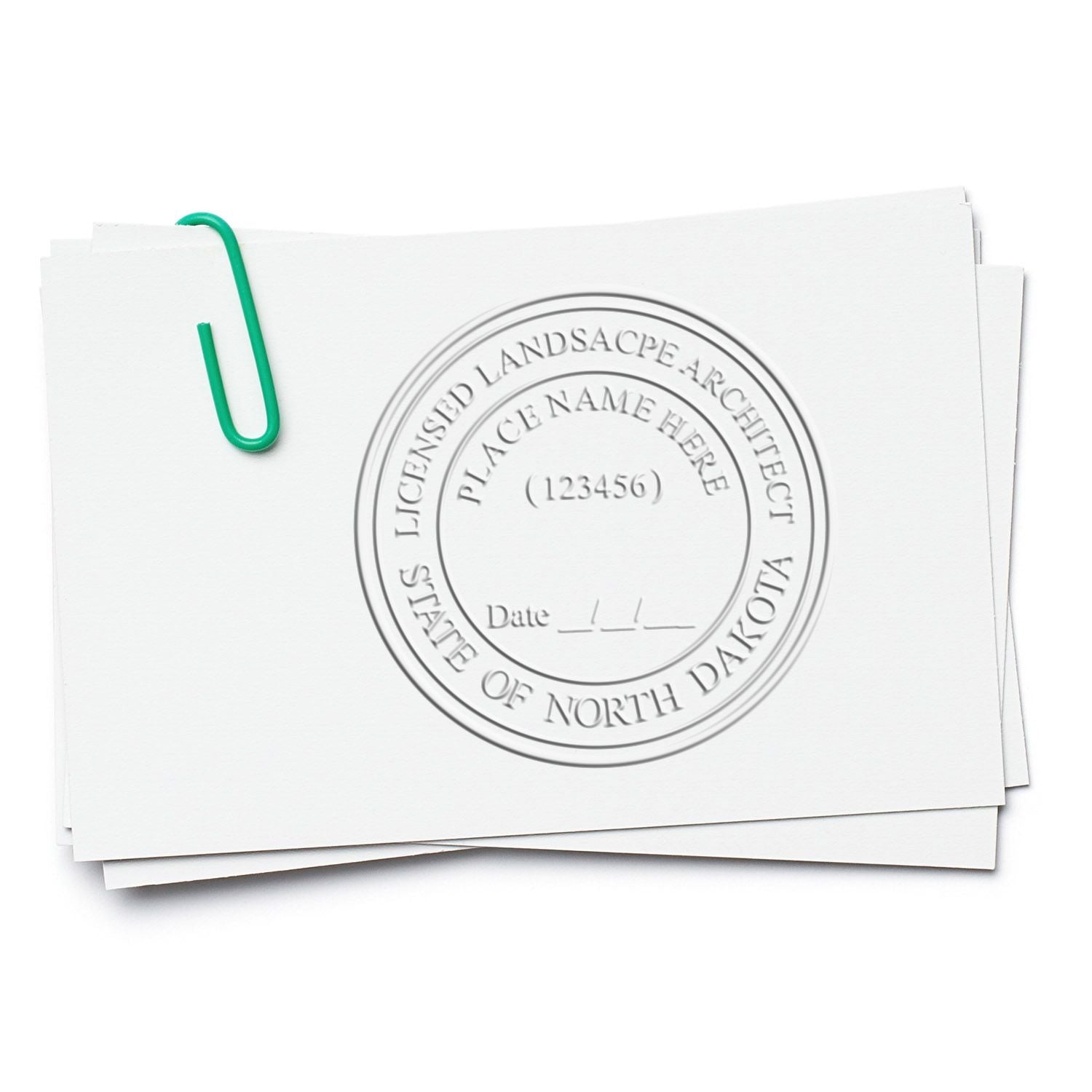 An alternative view of the Gift North Dakota Landscape Architect Seal stamped on a sheet of paper showing the image in use