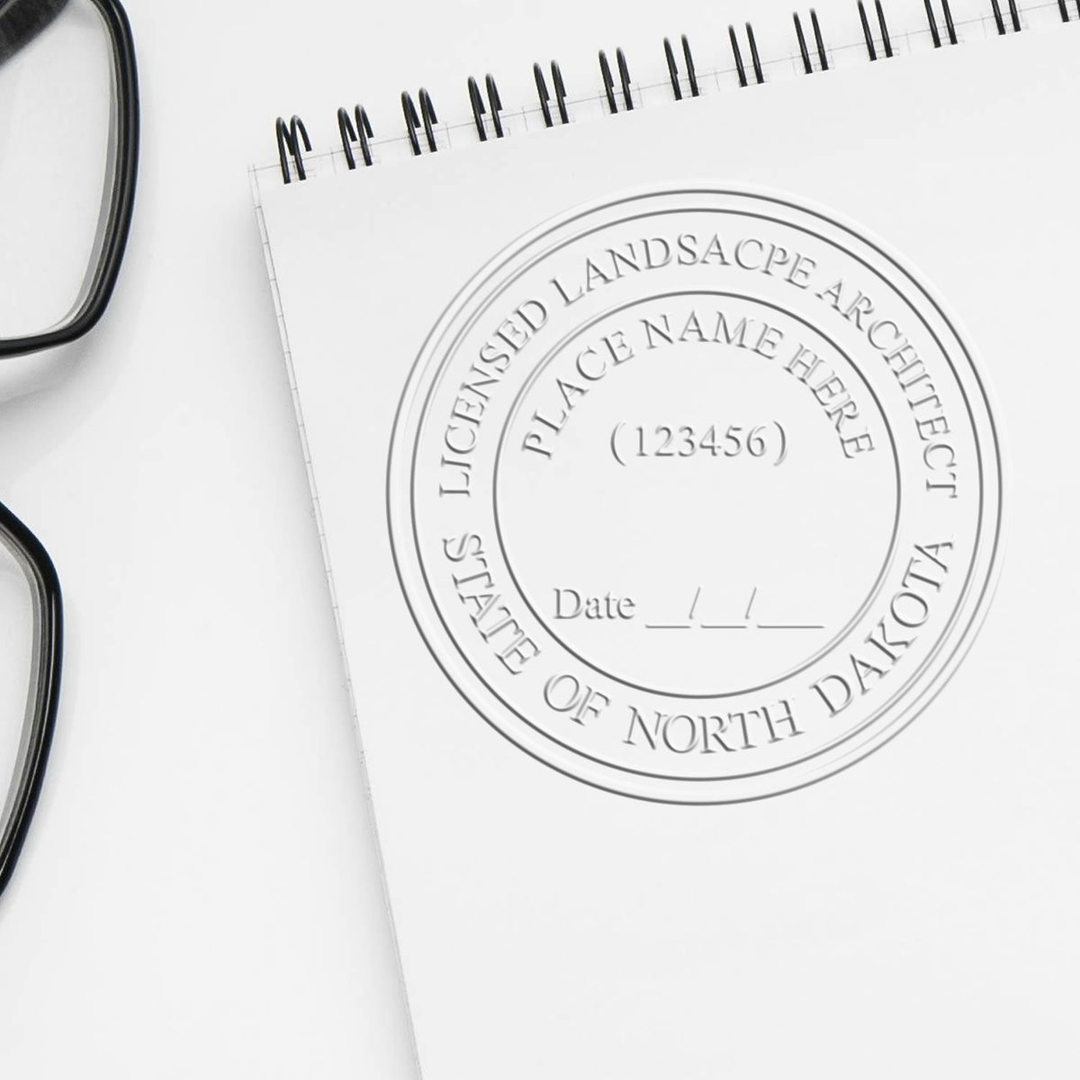 A stamped imprint of the Gift North Dakota Landscape Architect Seal in this stylish lifestyle photo, setting the tone for a unique and personalized product.