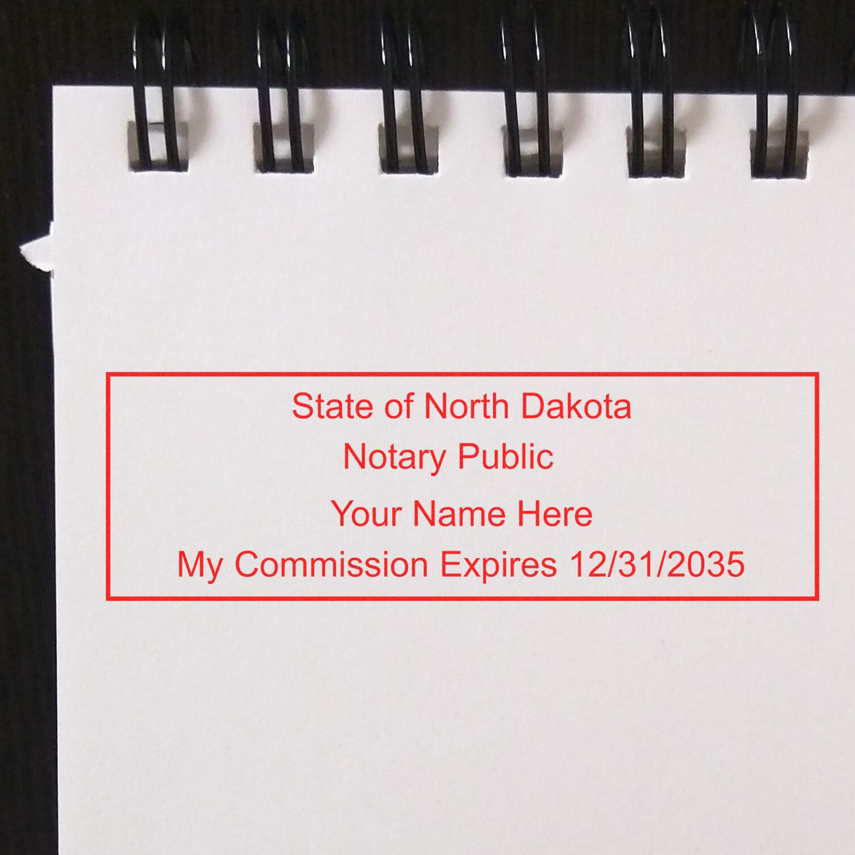 The Self-Inking Rectangular North Dakota Notary Stamp stamp impression comes to life with a crisp, detailed photo on paper - showcasing true professional quality.
