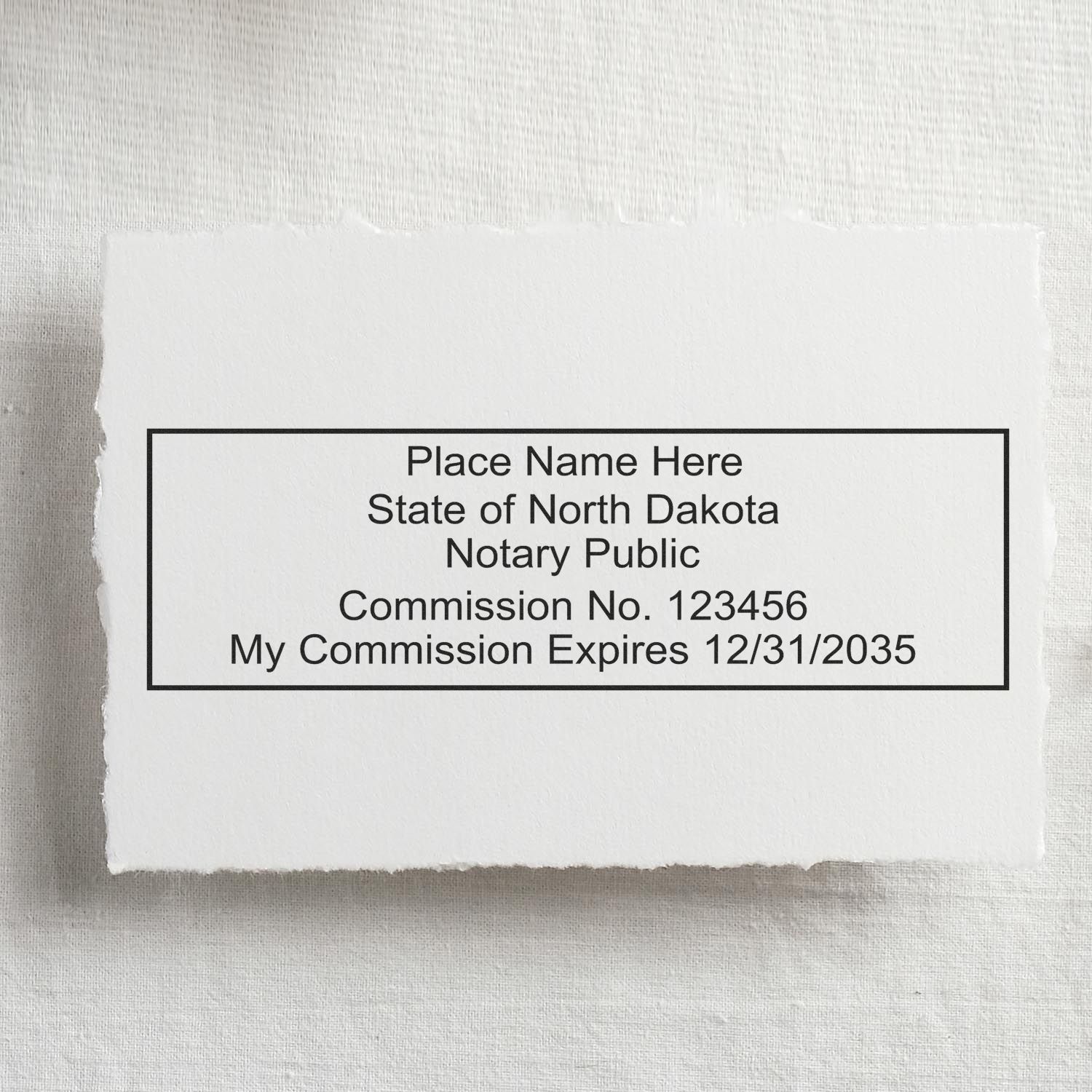 North Dakota Rectangular Digital Notary Seal in use photo showing a stamped imprint of the North Dakota Rectangular Digital Notary Seal