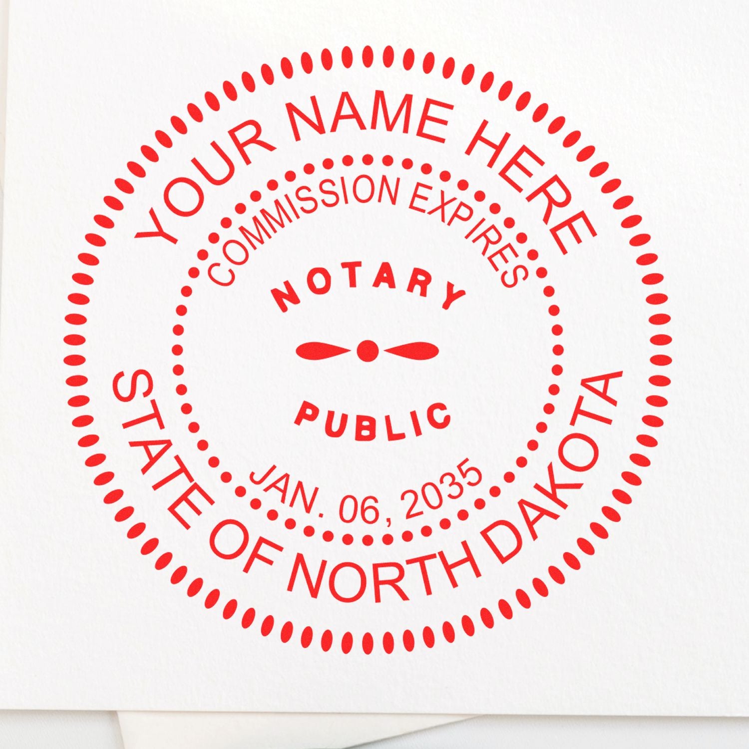 Round North Dakota Notary Public Seal Stamp in use photo showing a stamped imprint of the Round North Dakota Notary Public Seal Stamp