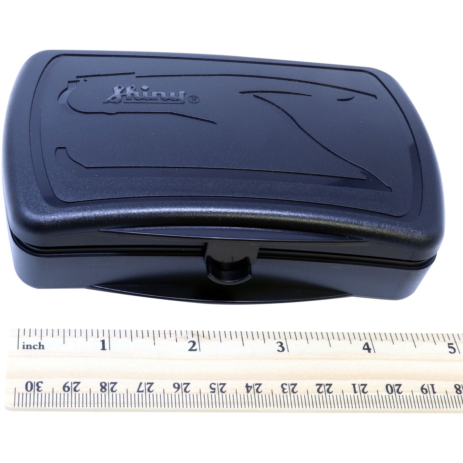 Black Notary Seal Storage Box with a sleek design, placed next to a ruler for size reference.