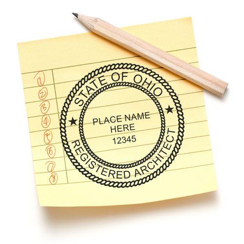 Self Inking Ohio Architect Stamp on a yellow notepad with a pencil, displaying the State of Ohio Registered Architect seal.