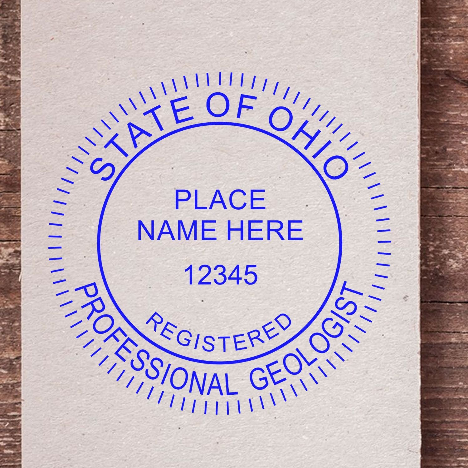 An alternative view of the Slim Pre-Inked Ohio Professional Geologist Seal Stamp stamped on a sheet of paper showing the image in use