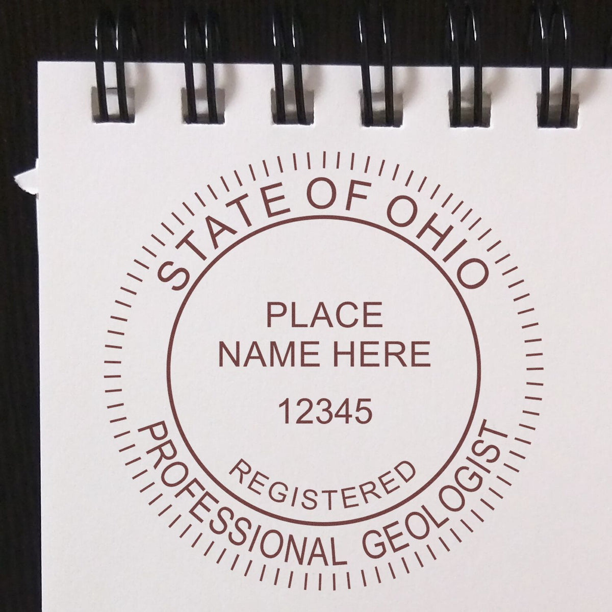 A photograph of the Premium MaxLight Pre-Inked Ohio Geology Stamp stamp impression reveals a vivid, professional image of the on paper.