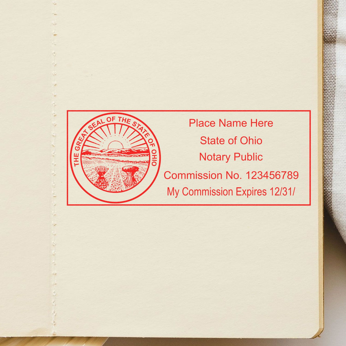An alternative view of the MaxLight Premium Pre-Inked Ohio State Seal Notarial Stamp stamped on a sheet of paper showing the image in use
