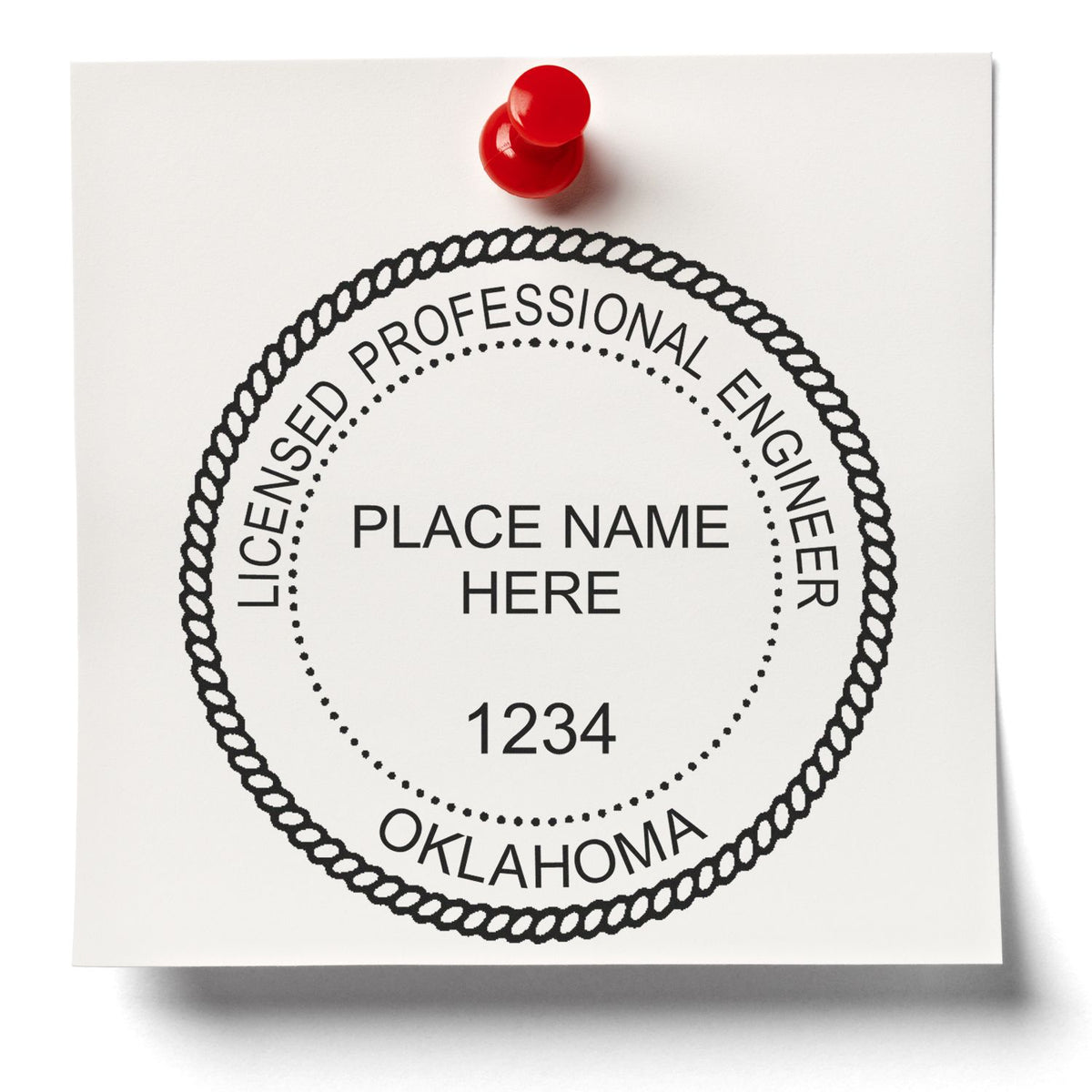 A lifestyle photo showing a stamped image of the Slim Pre-Inked Oklahoma Professional Engineer Seal Stamp on a piece of paper